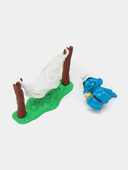 Игрушечная фигурка Schleich Smurf in Hammcock