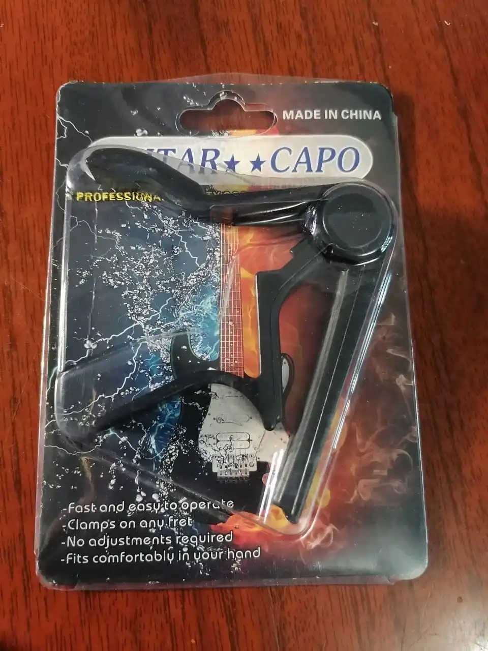 Каподастр для гитары, зажим для струн