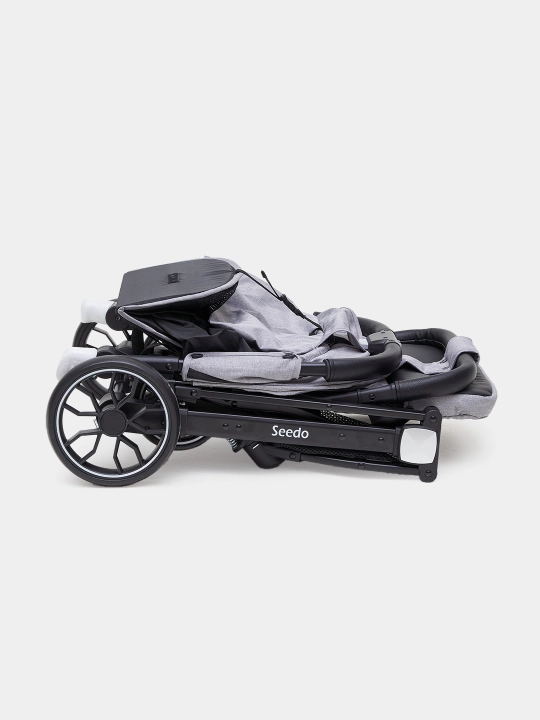 Aravacha Seedo Stroller S8, pastki savatcha va issiqlikni saqlab turuvchi g'ilof bilan