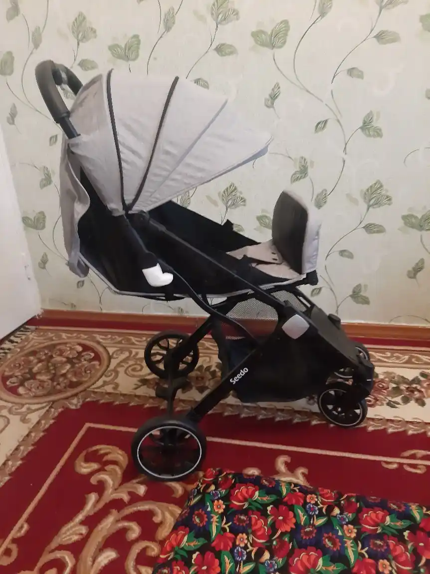 Aravacha Seedo Stroller S8, pastki savatcha va issiqlikni saqlab turuvchi g'ilof bilan