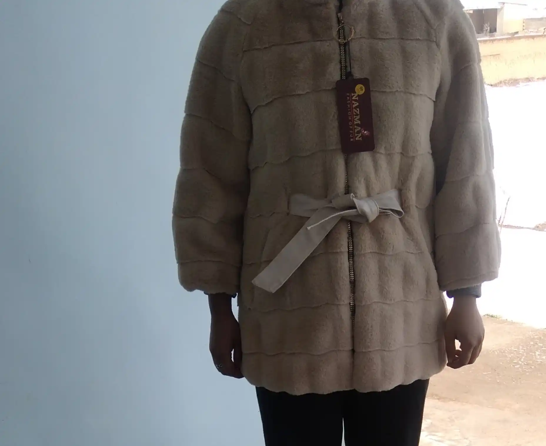 Ekomo'ynadan belbog'li shuba, Nazman Textile