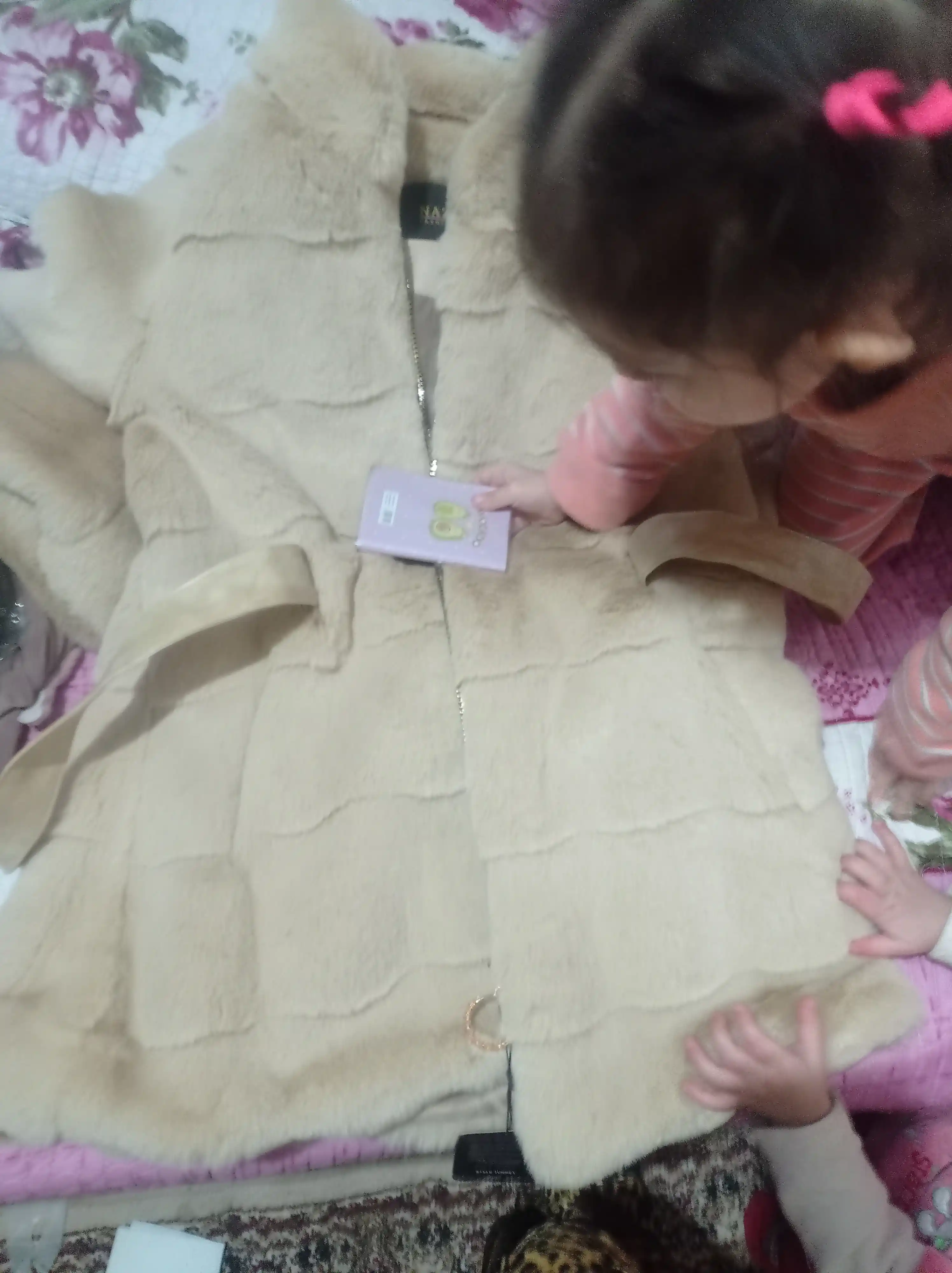 Ekomo'ynadan belbog'li shuba, Nazman Textile