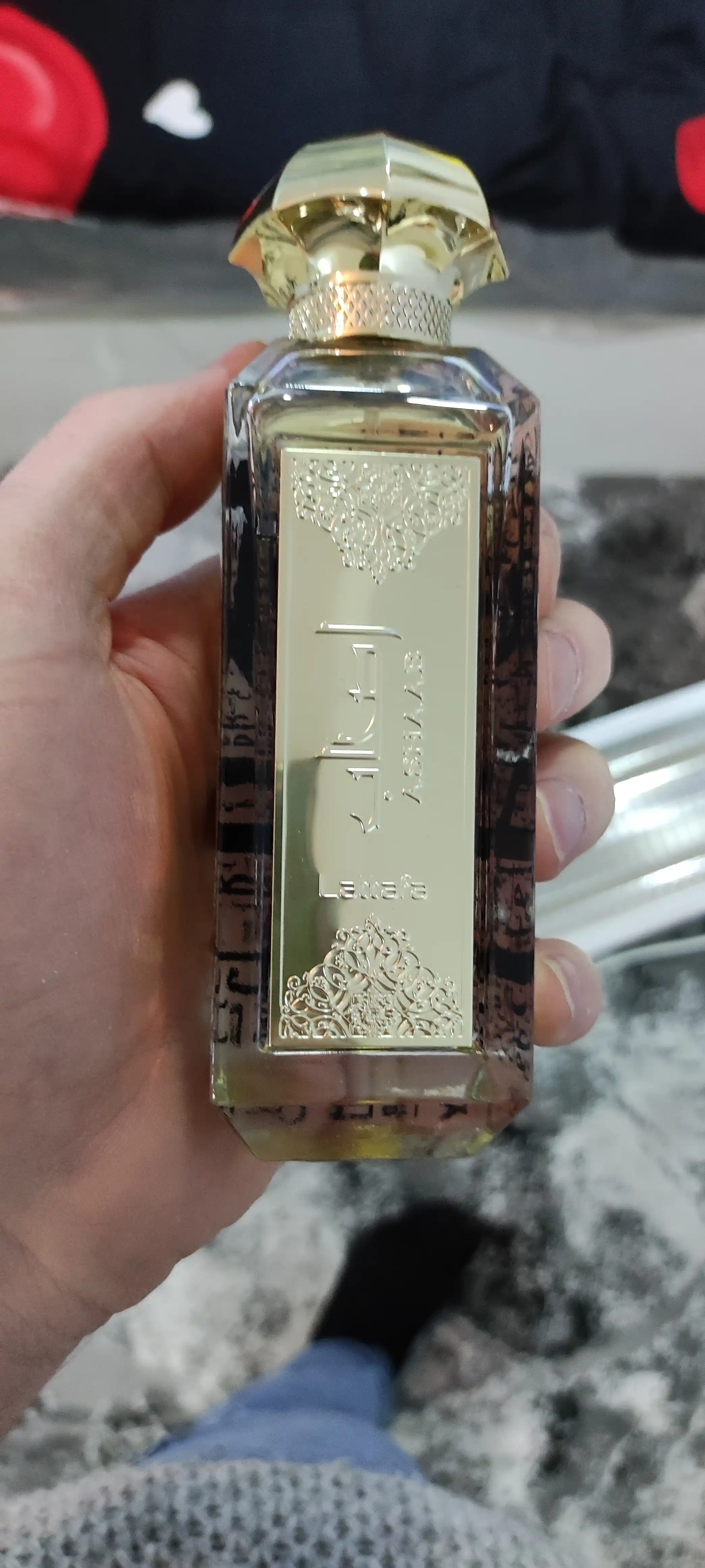Parfyumlangan suv erkaklar uchun Ashaab Lattafa, 100 ml