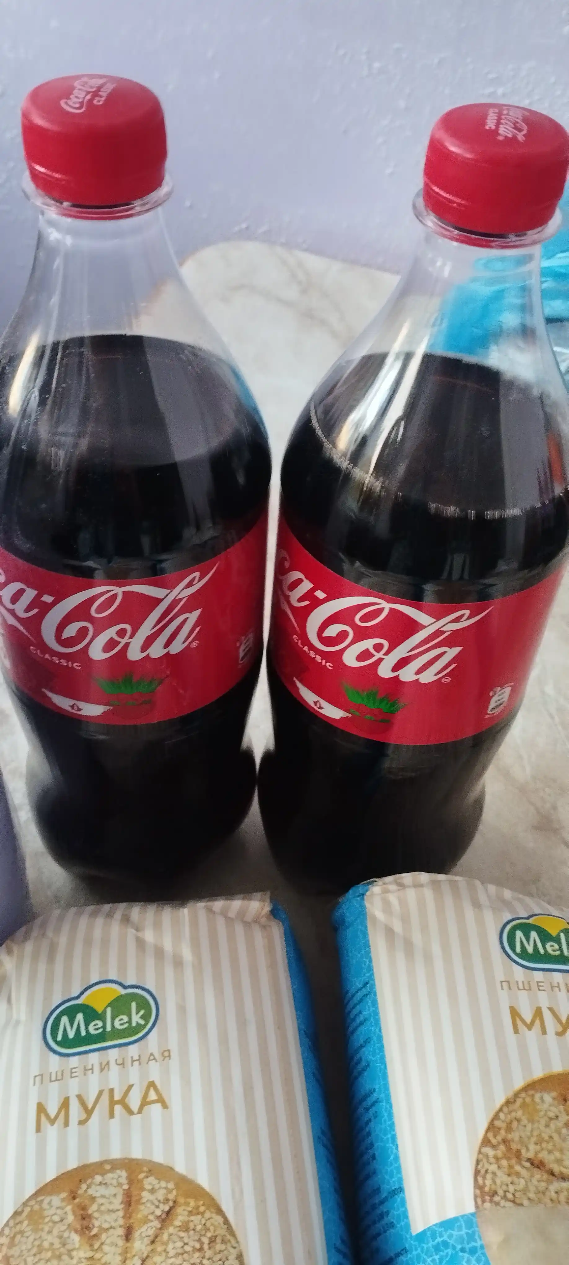 Gazlangan ichimlik Coca Cola Classic, 1 litr