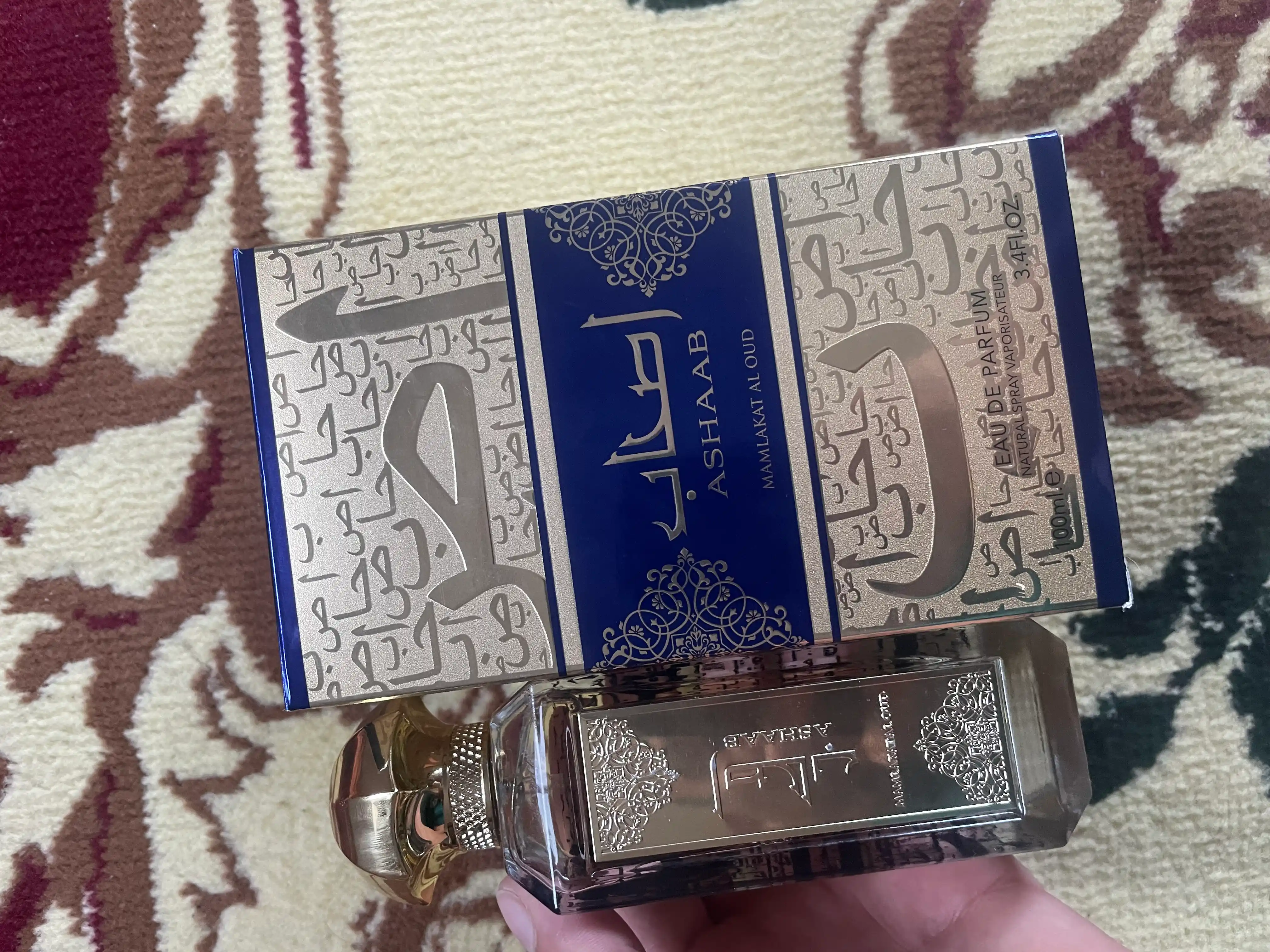 Parfyumlangan suv erkaklar uchun Ashaab Lattafa, 100 ml