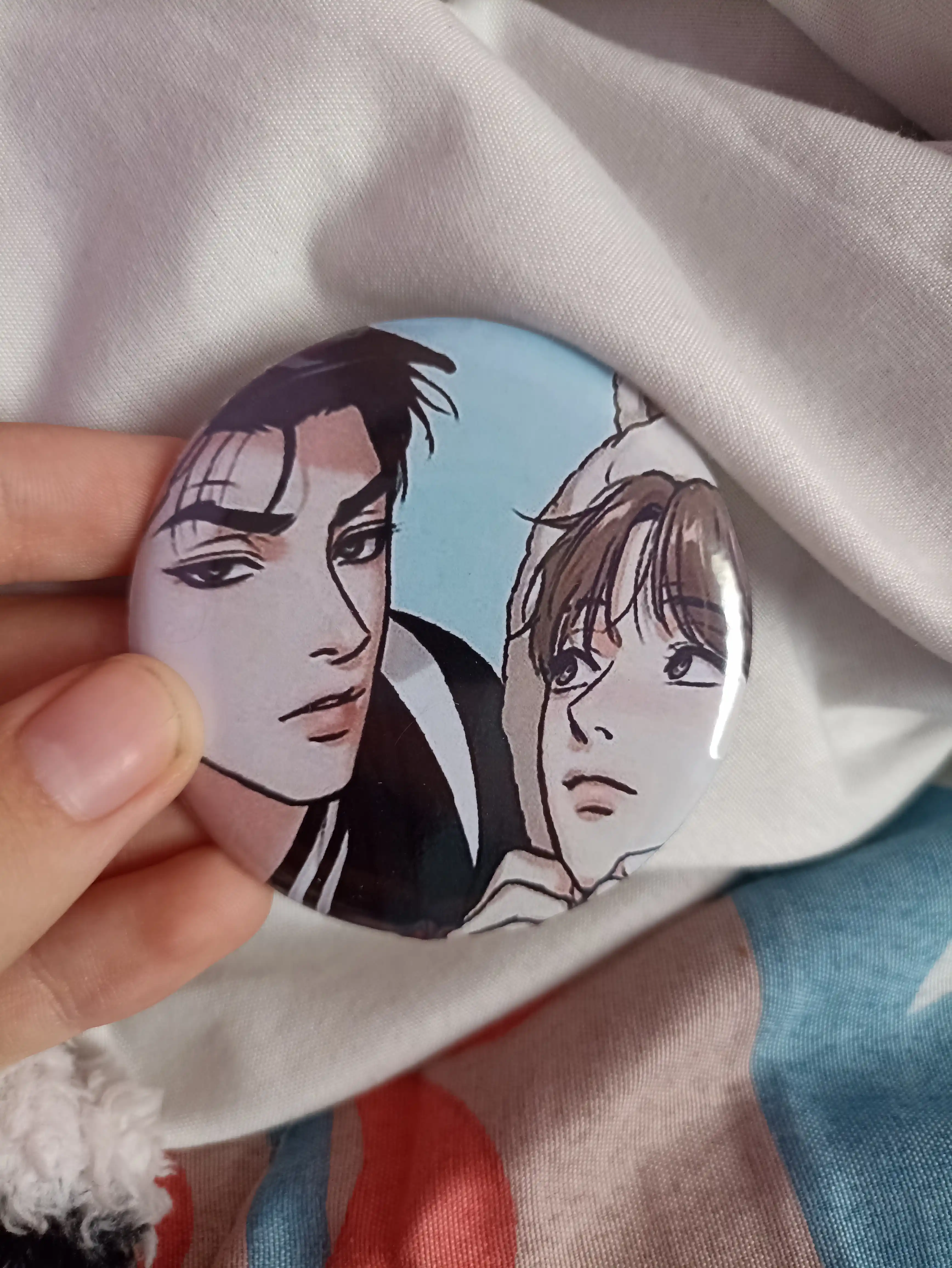 Nishon manga va manxva, 58 mm va 38 mm