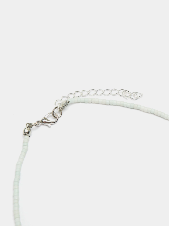 Toshli oq choker Pushti ko‘z
