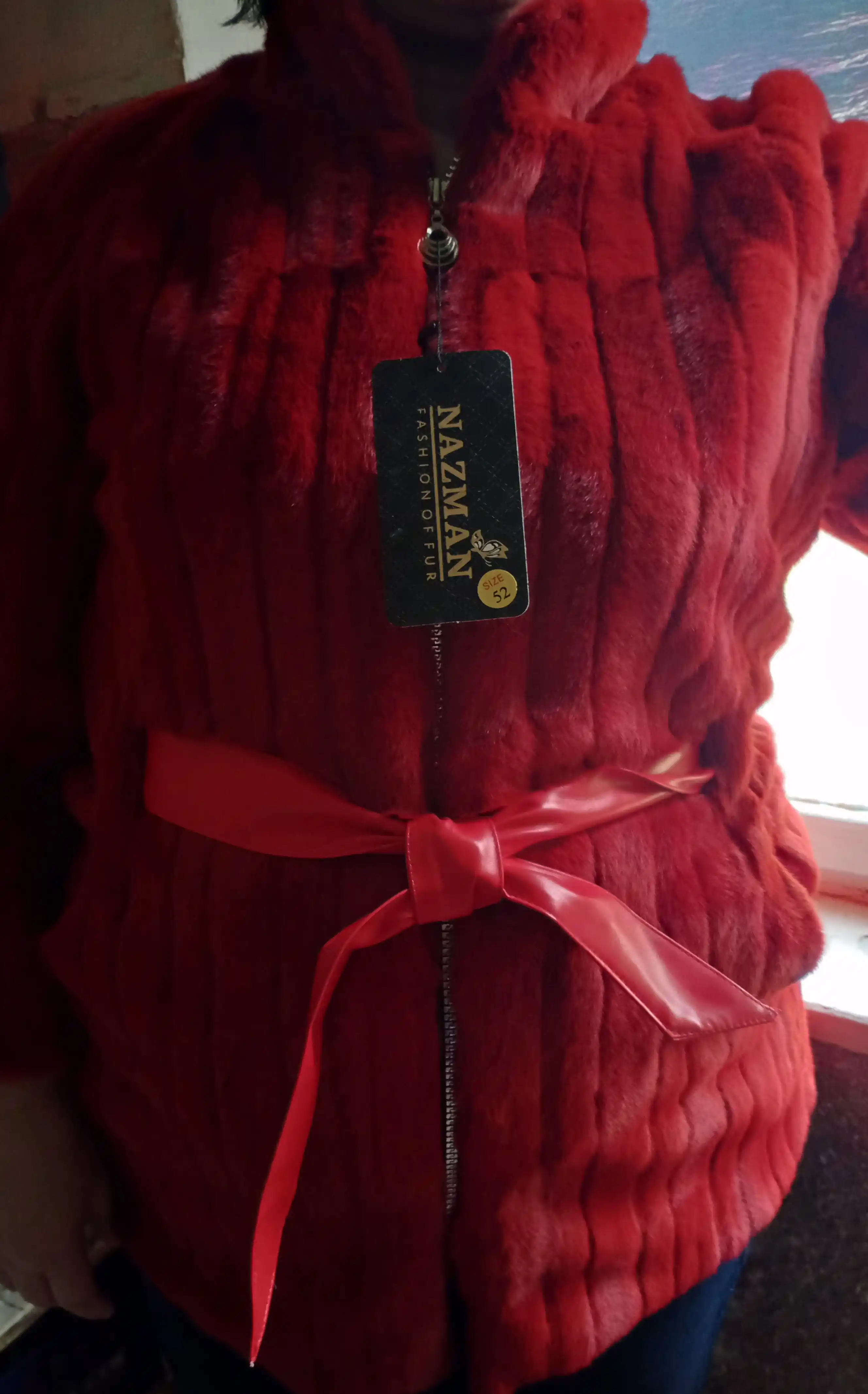 Ekomo'ynadan belbog'li shuba, Nazman Textile