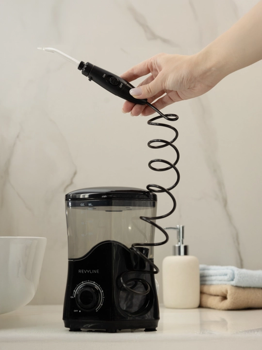 Statsionar irrigator Revyline RL 100 og‘iz bo‘shlig‘i uchun 600 ml 10 rejim