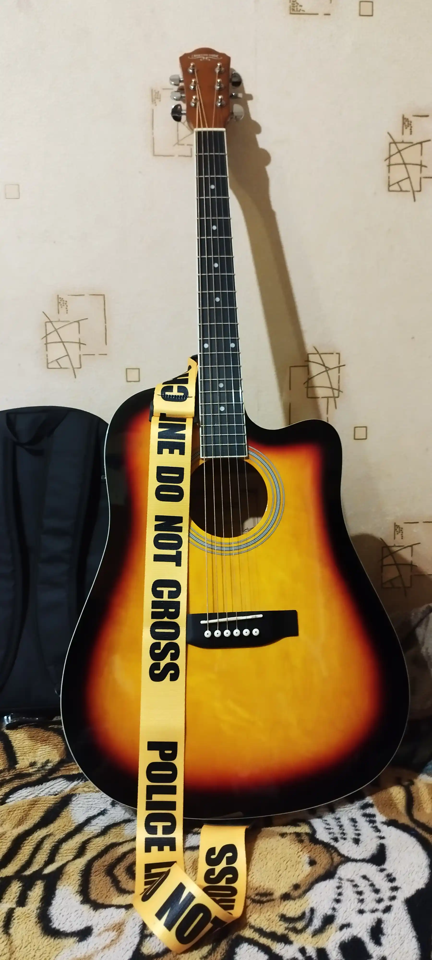 Gitara, ukulele tasmasi, sozlanishi