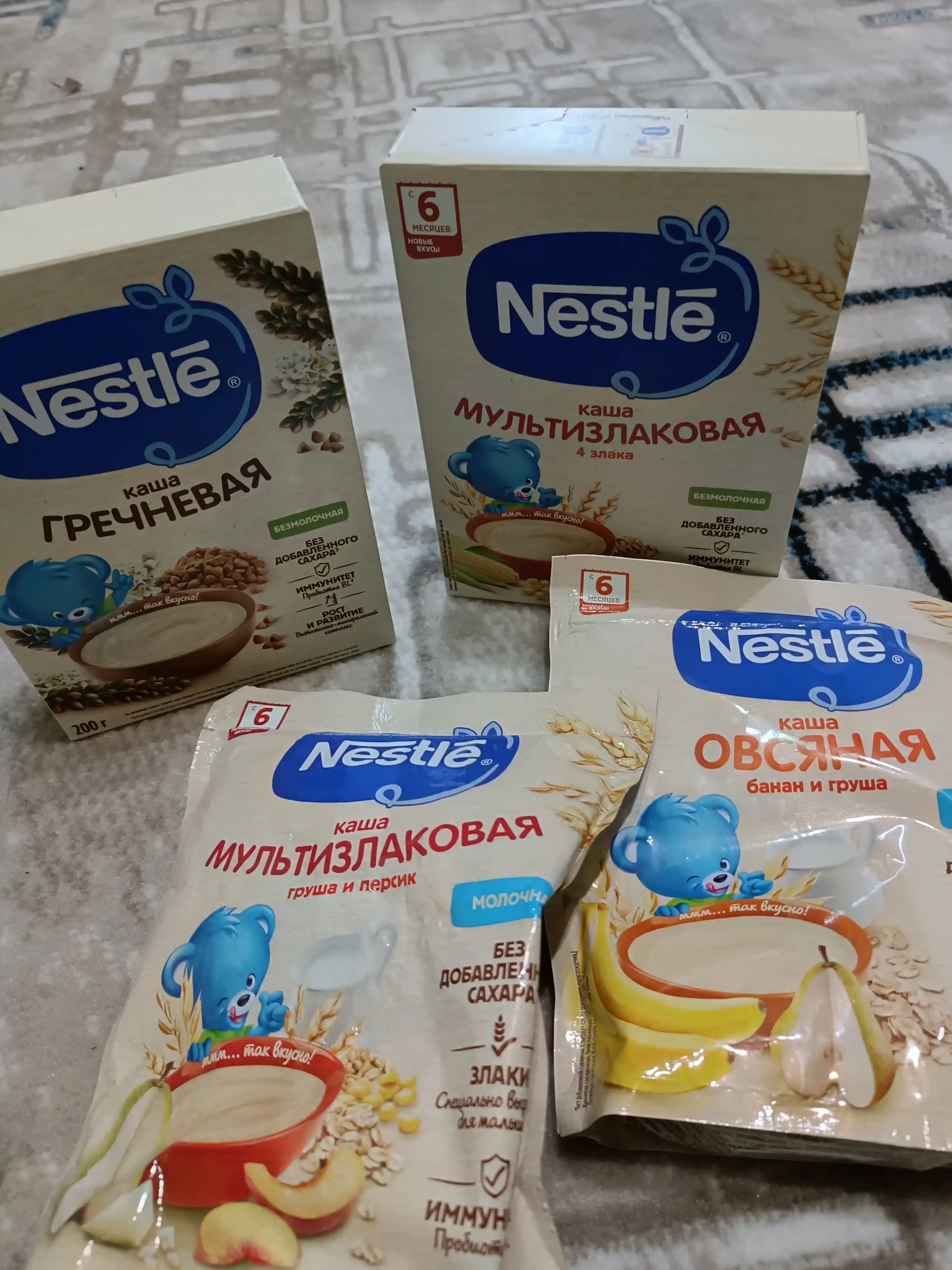 NESTLE® sutli ko‘pzraxli bo‘tqa, nok va shaftoli bilan, 6 oylikdan boshlab, 200 g