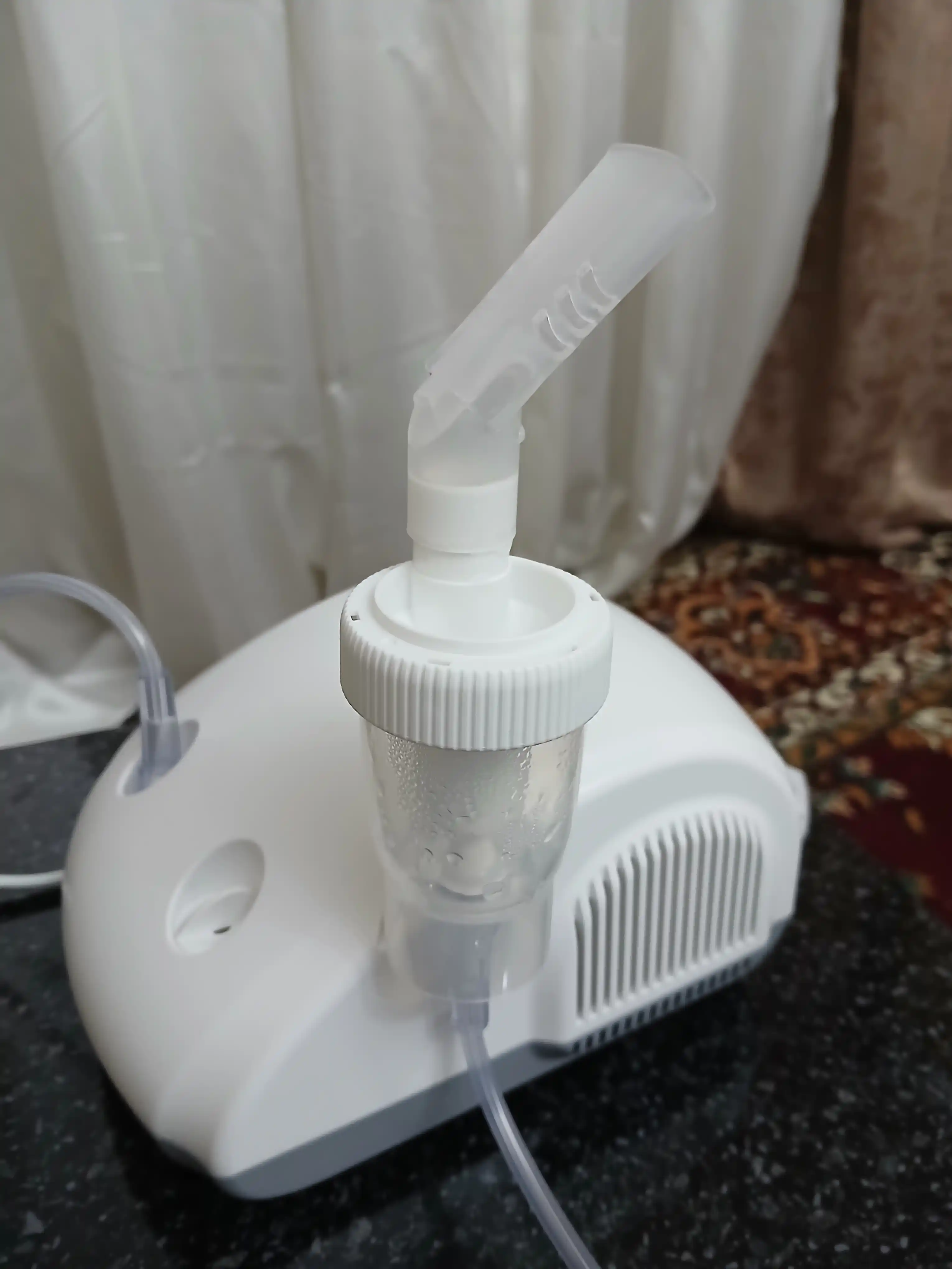 Shveytsariyalik kompressor ingalyatori-nebulayzeri NE100 Rossmax Swiss