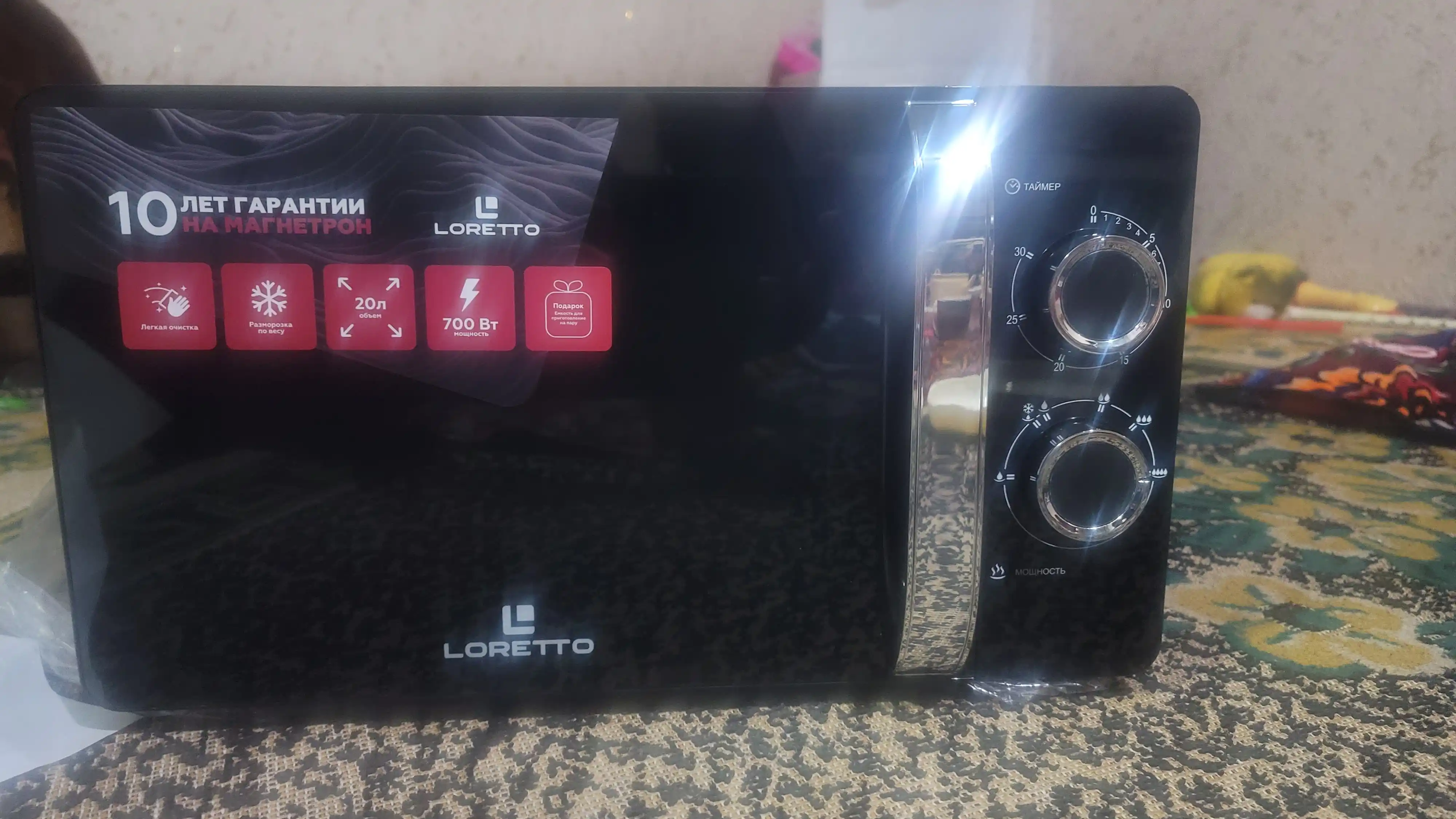 Mikroto'lqinli pech Loretto LM-2101, LM-2102, LM-2103, LM-2104, LM-2105, LM-2302, LM-2306