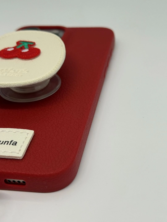 IPhone uchun ushlagichli va pop-socketli g'ilof