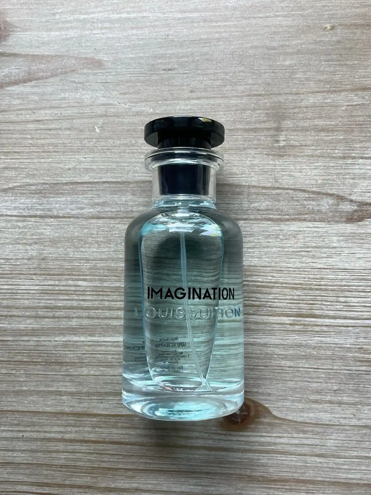 Erkaklar uchun parfyumlangan suv Imagination, 100 ml