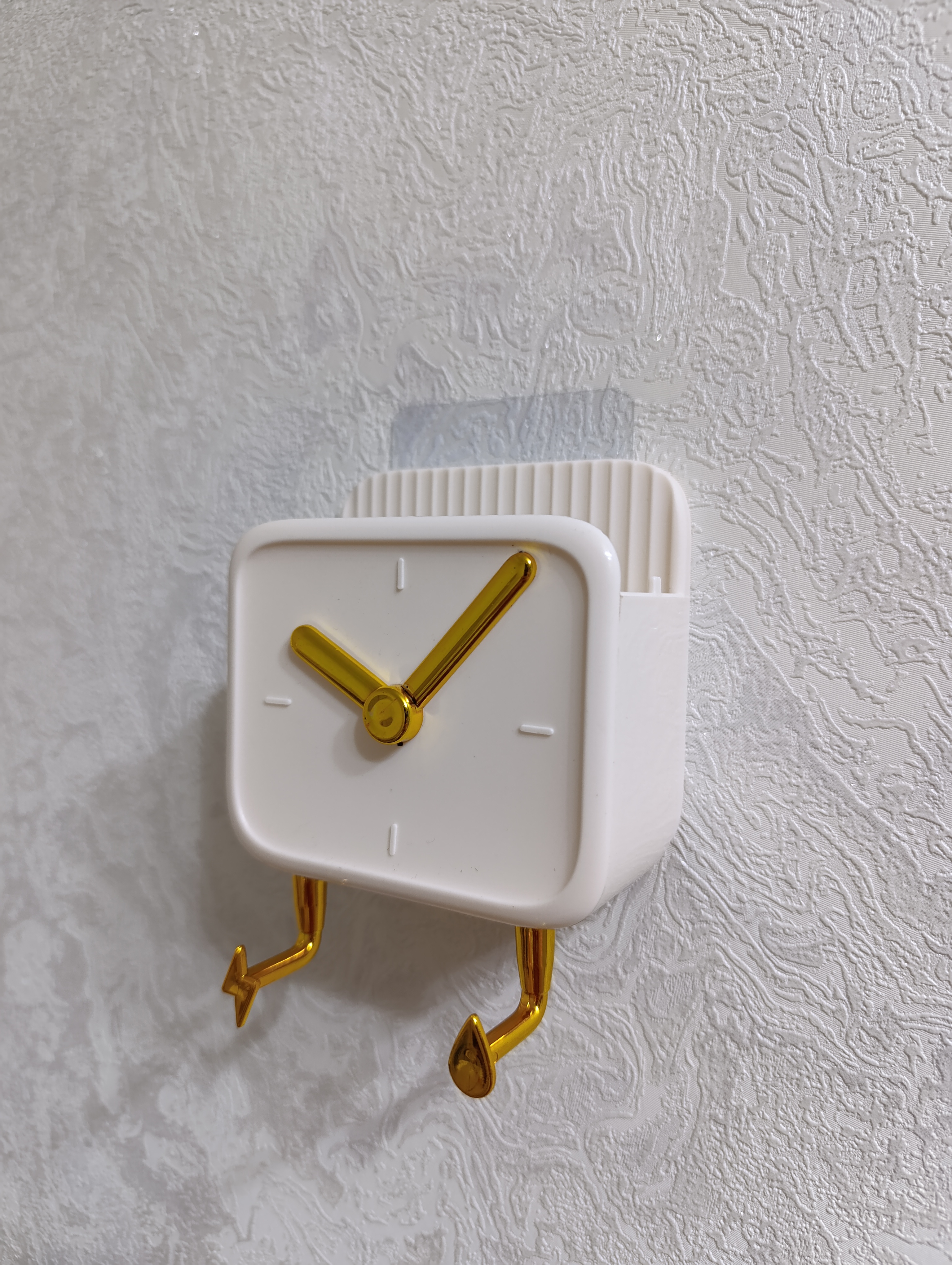 Telefon va pult uchun devor ushlagichi