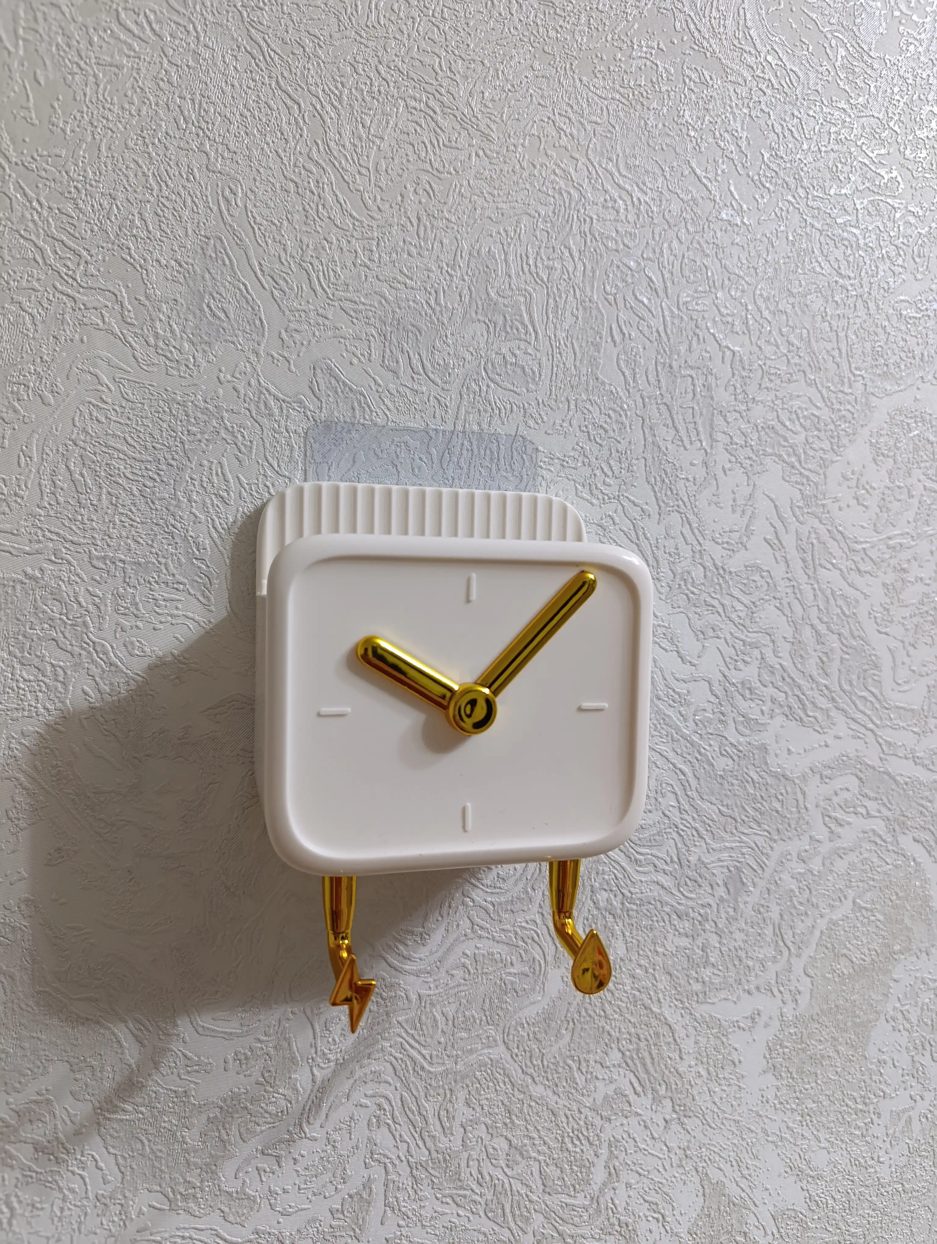 Telefon va pult uchun devor ushlagichi