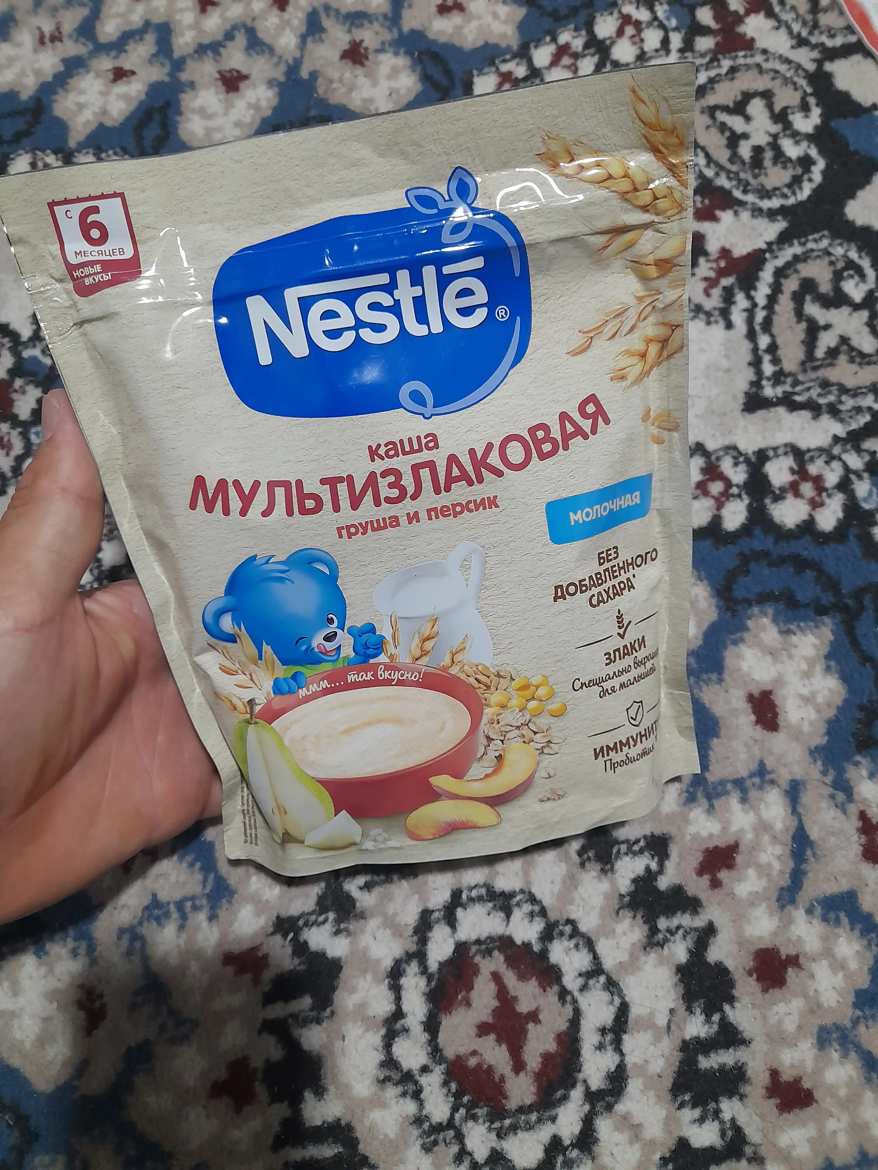 NESTLE® sutli ko‘pzraxli bo‘tqa, nok va shaftoli bilan, 6 oylikdan boshlab, 200 g