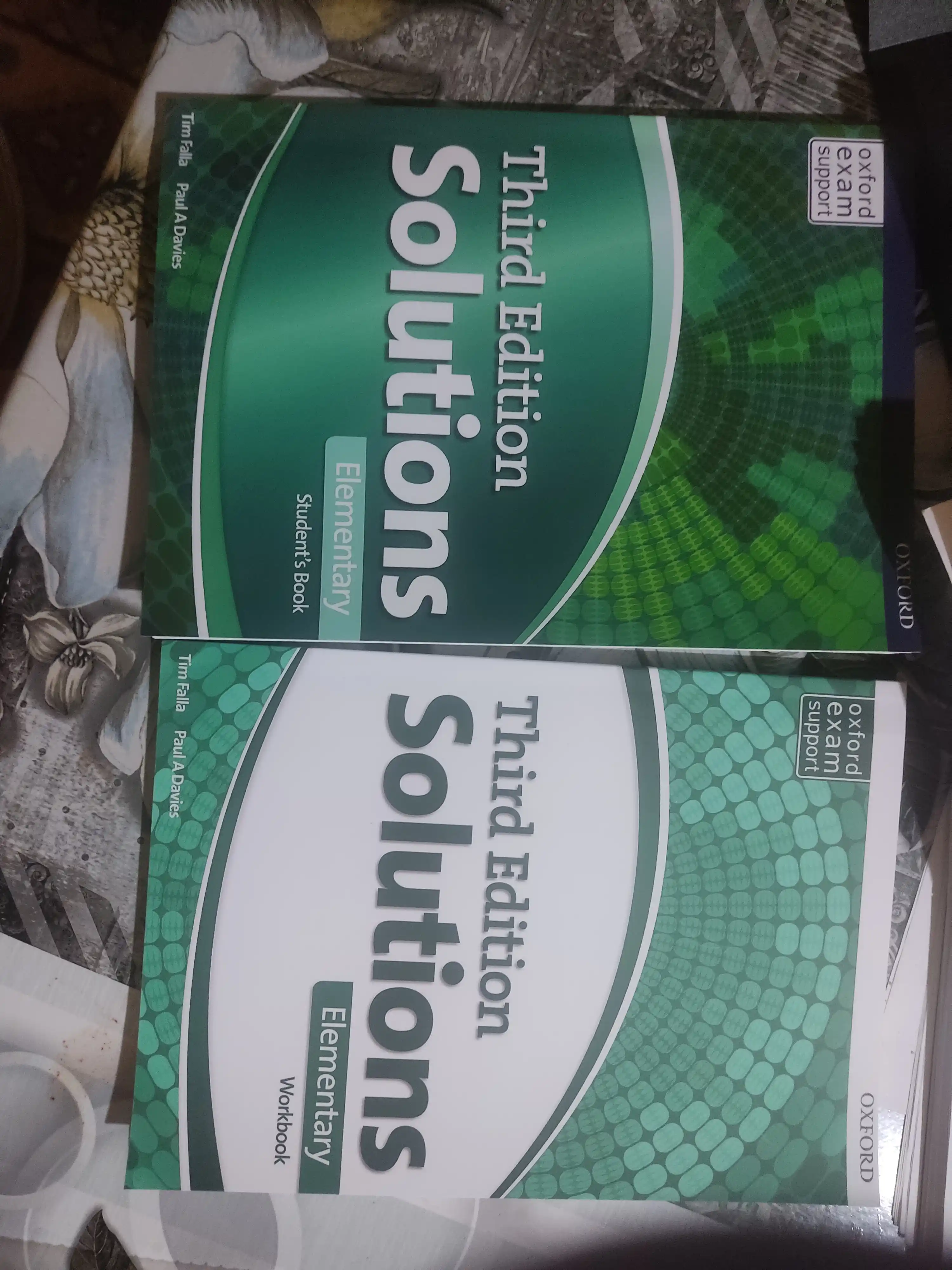 Solutions third Edition. Elementary, Pre-intermediate, Intermediate. Studentbook+Workbook