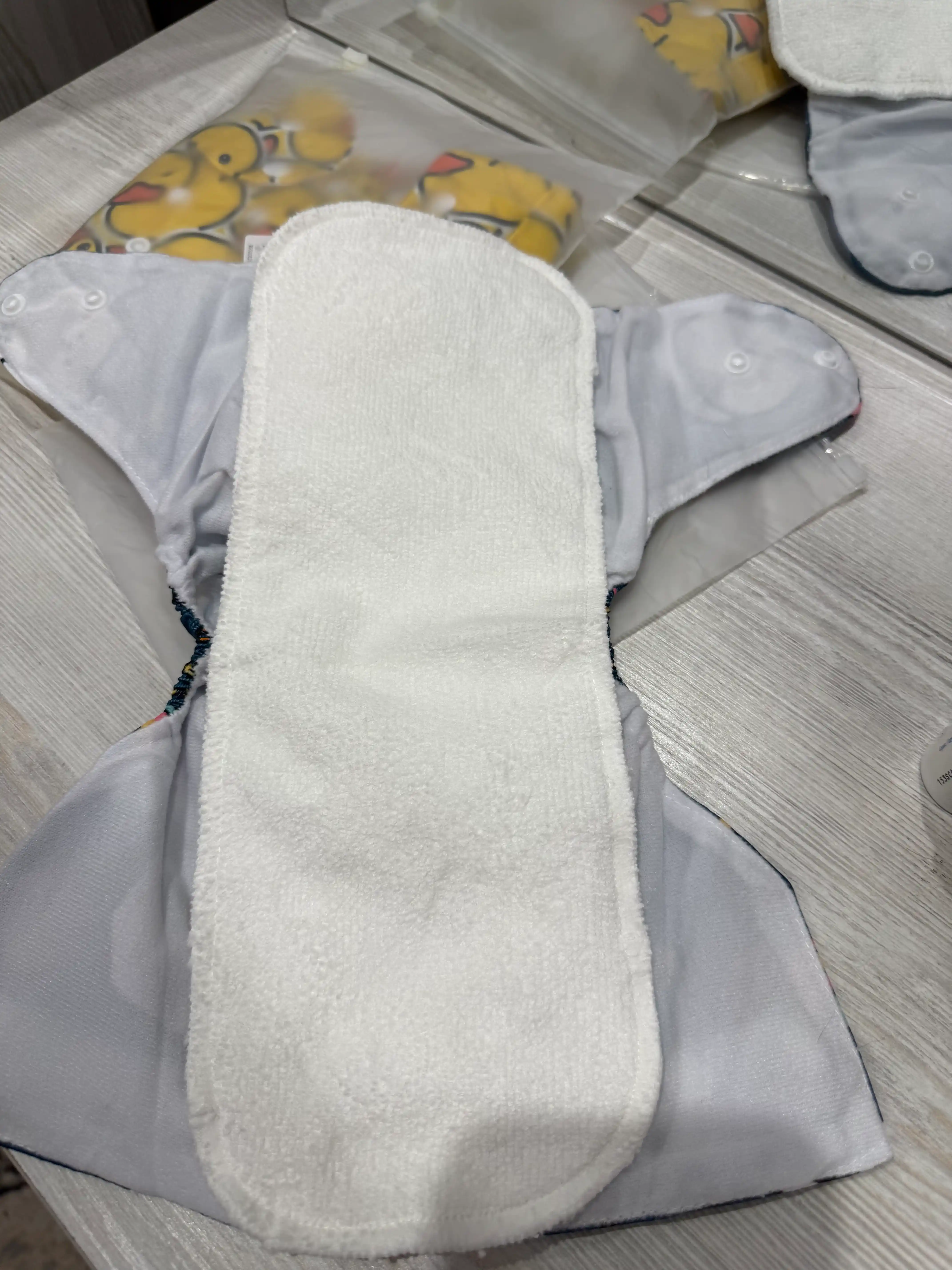 Ko‘p marta ishlatiladigan tagliklar, vkladishli, tuvakka o‘rgatish uchun, 3-15 kg