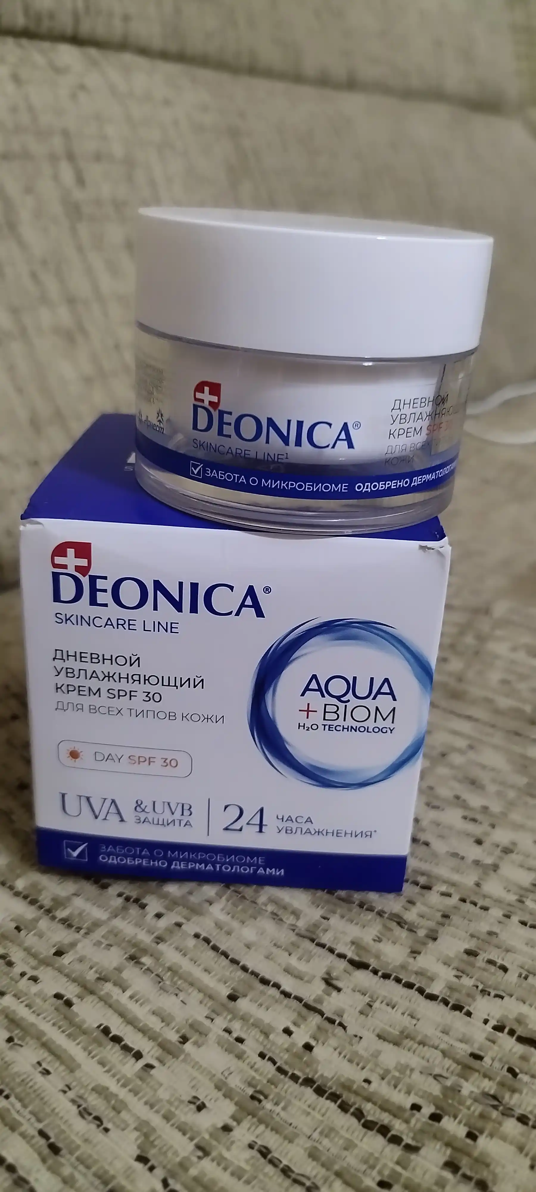 Deonica teri parvarish quyoshdan himoya qiluvchi SPF 30 bilan kunduzgi namlovchi yuz kremi