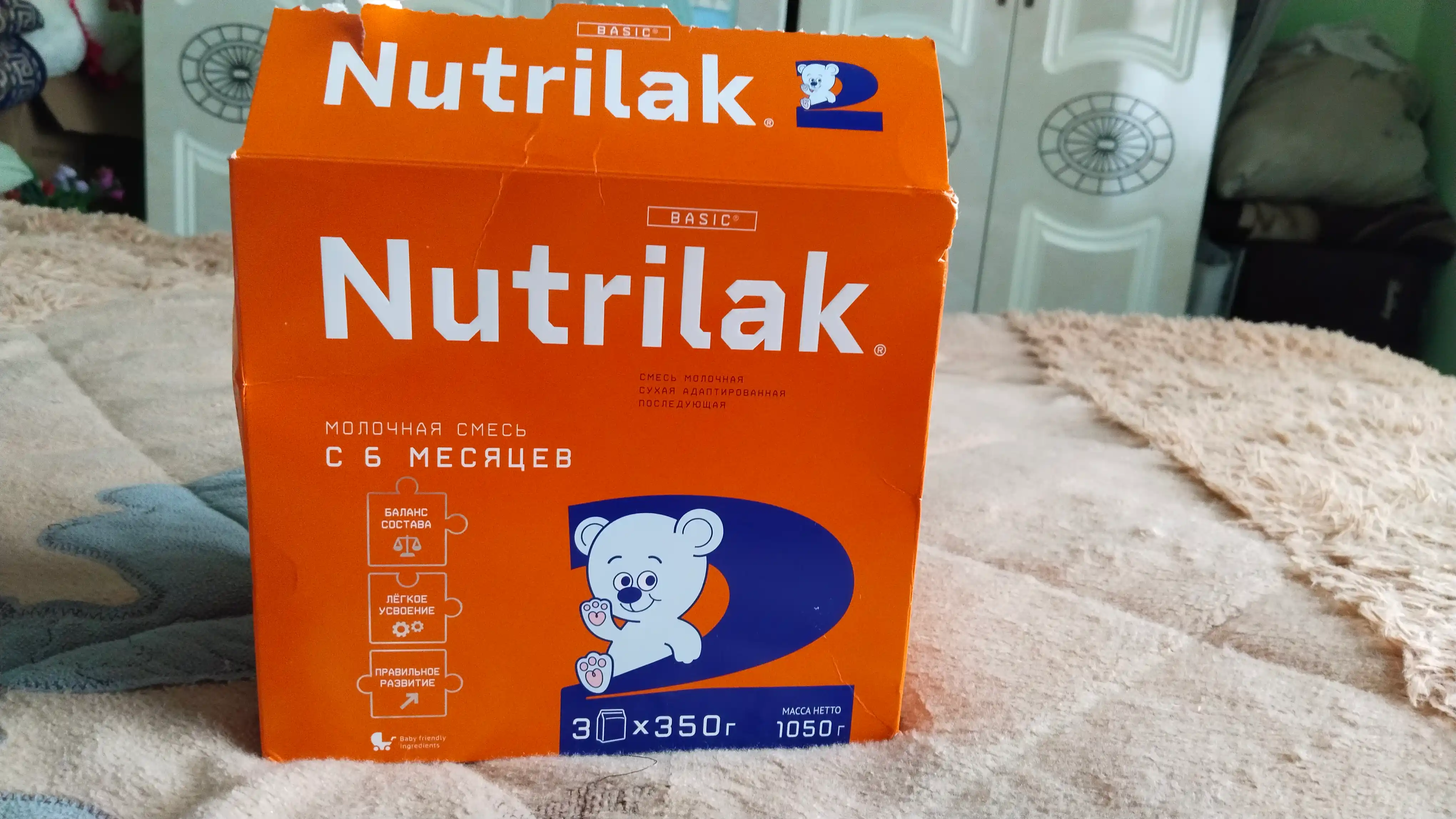 Quruq sutli aralashma Nutrilak 2, keyinchalik moslashtirilgan, 1050 gr