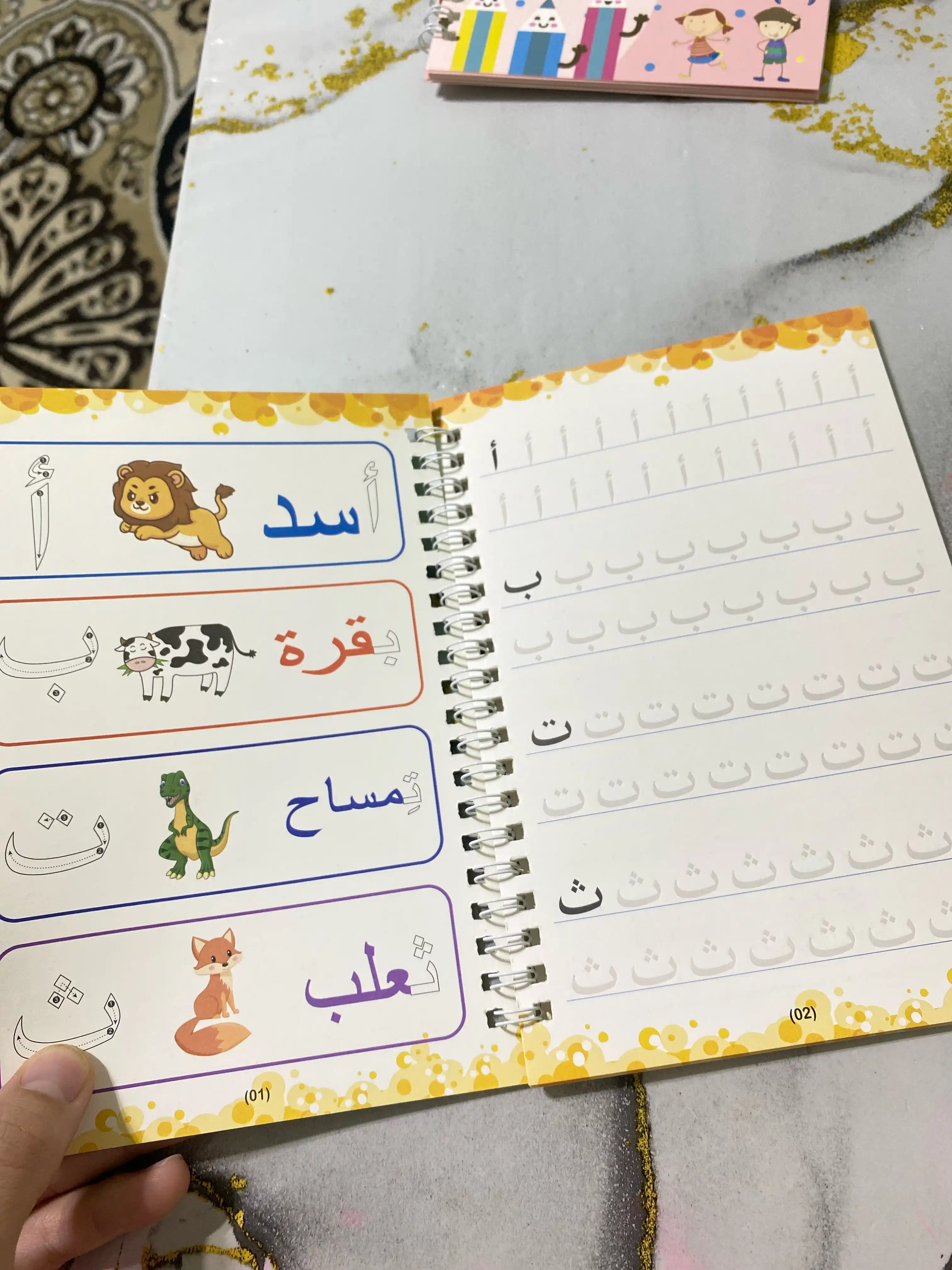 Sehrli yozuv daftari ingliz va 4 xil tilida, qayta foydalaniladigan, arab, ingliz, o'zbek