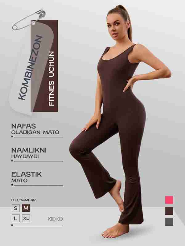 Oyoqlarini yoygan taytdagi ayolning fotosurati Oyoqlarini yoygan taytdagi ayolning fotosurati