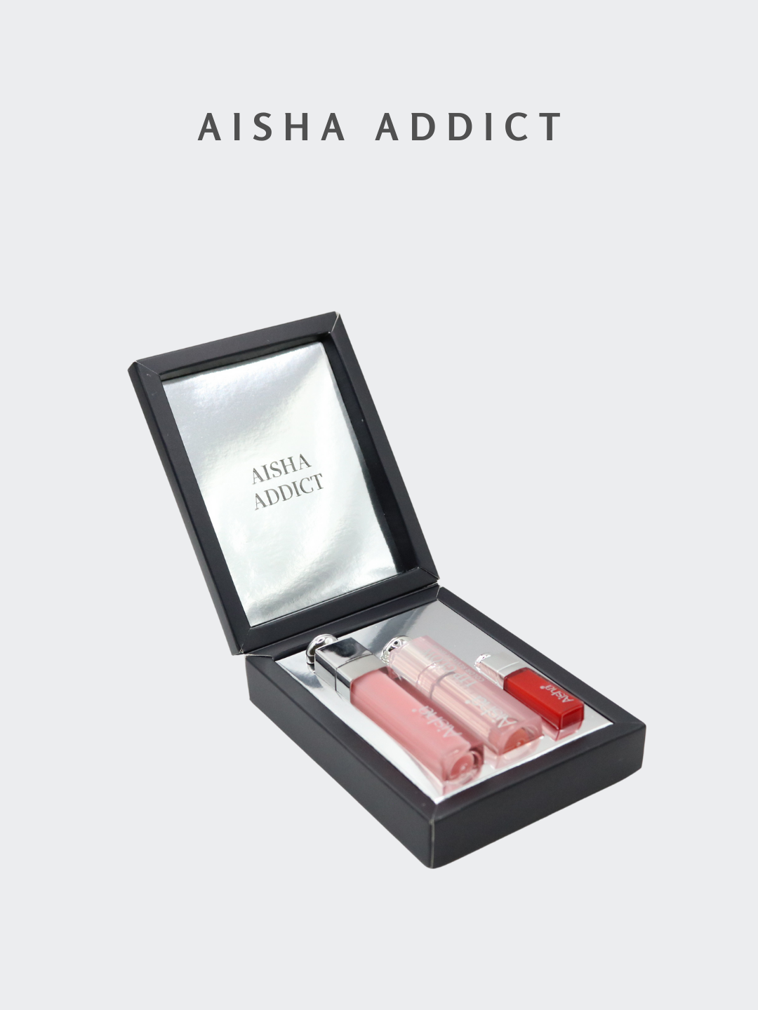 Aisha Addict Lip Gloss Set — 3 ta 1 da to‘plam: lablar uchun balzam va yaltiroq - 