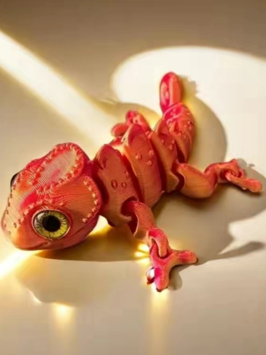 3D harakatlanuvchi xameleon figurasi