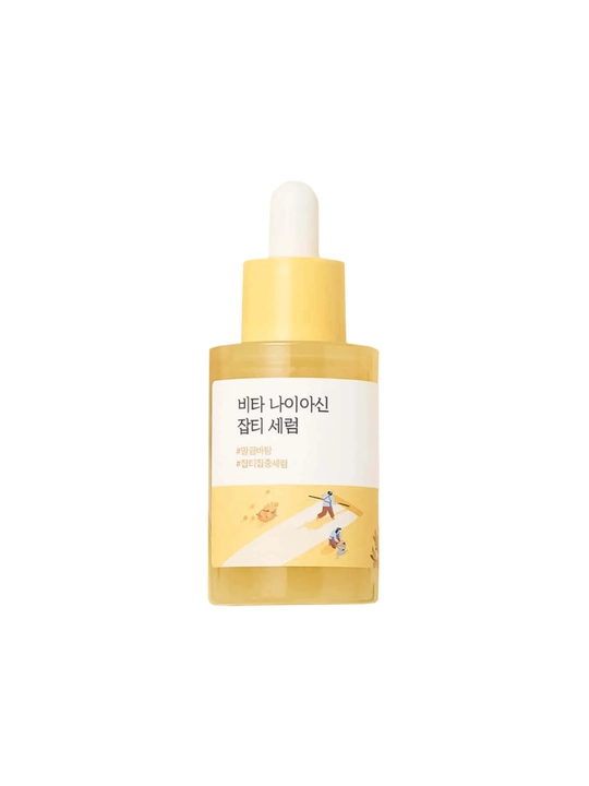 Round Lab Vita Niacinamide Dark Spot Serum bilan tiniqlashtiruvchi kapsulali zardob
