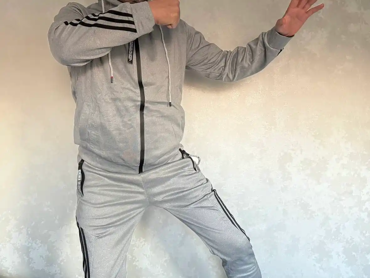 Erkaklar sport to‘plami: chaqmoq, kofta va shim
