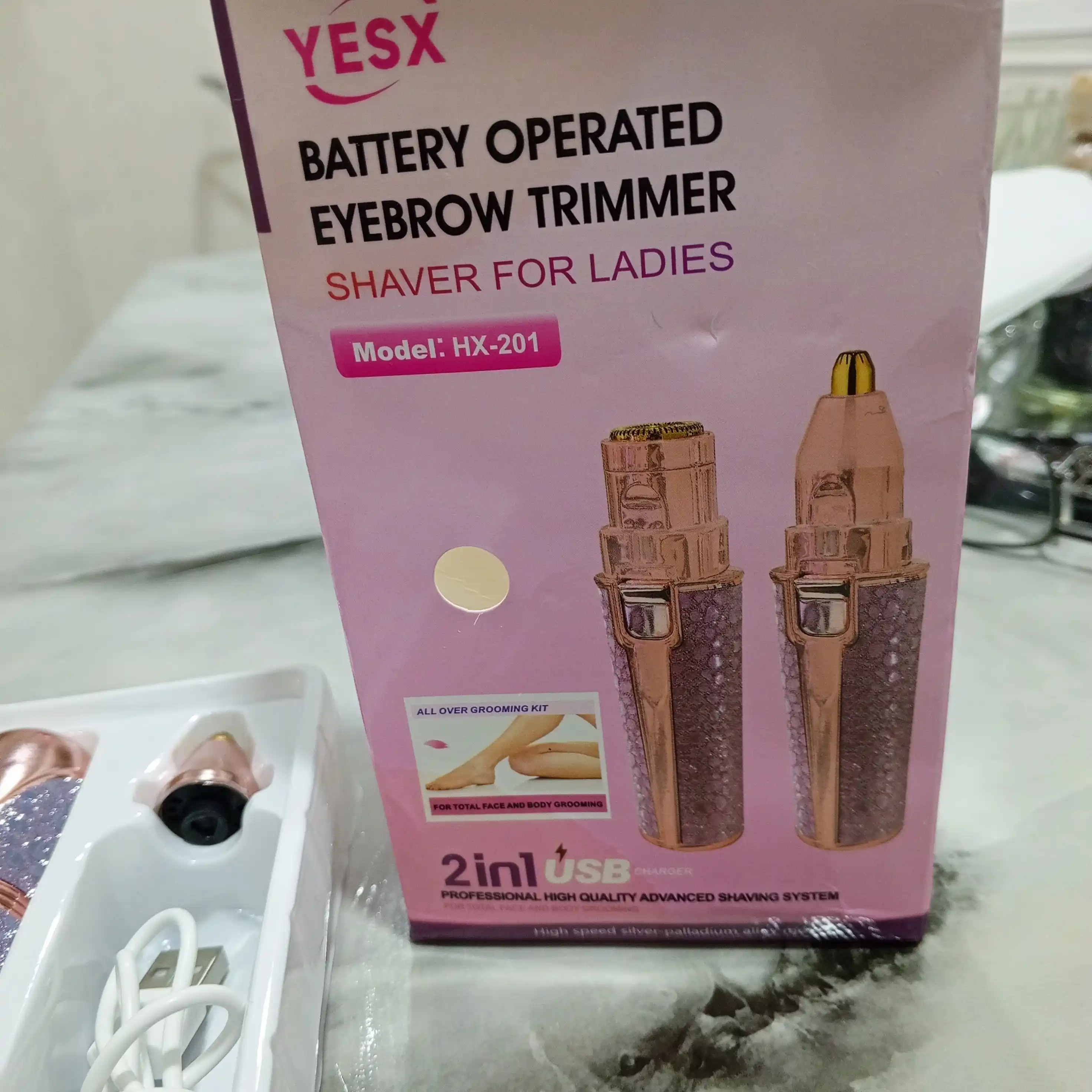 Yuz va tanadagi sochlarni olib tashlash uchun ayollar epilyator