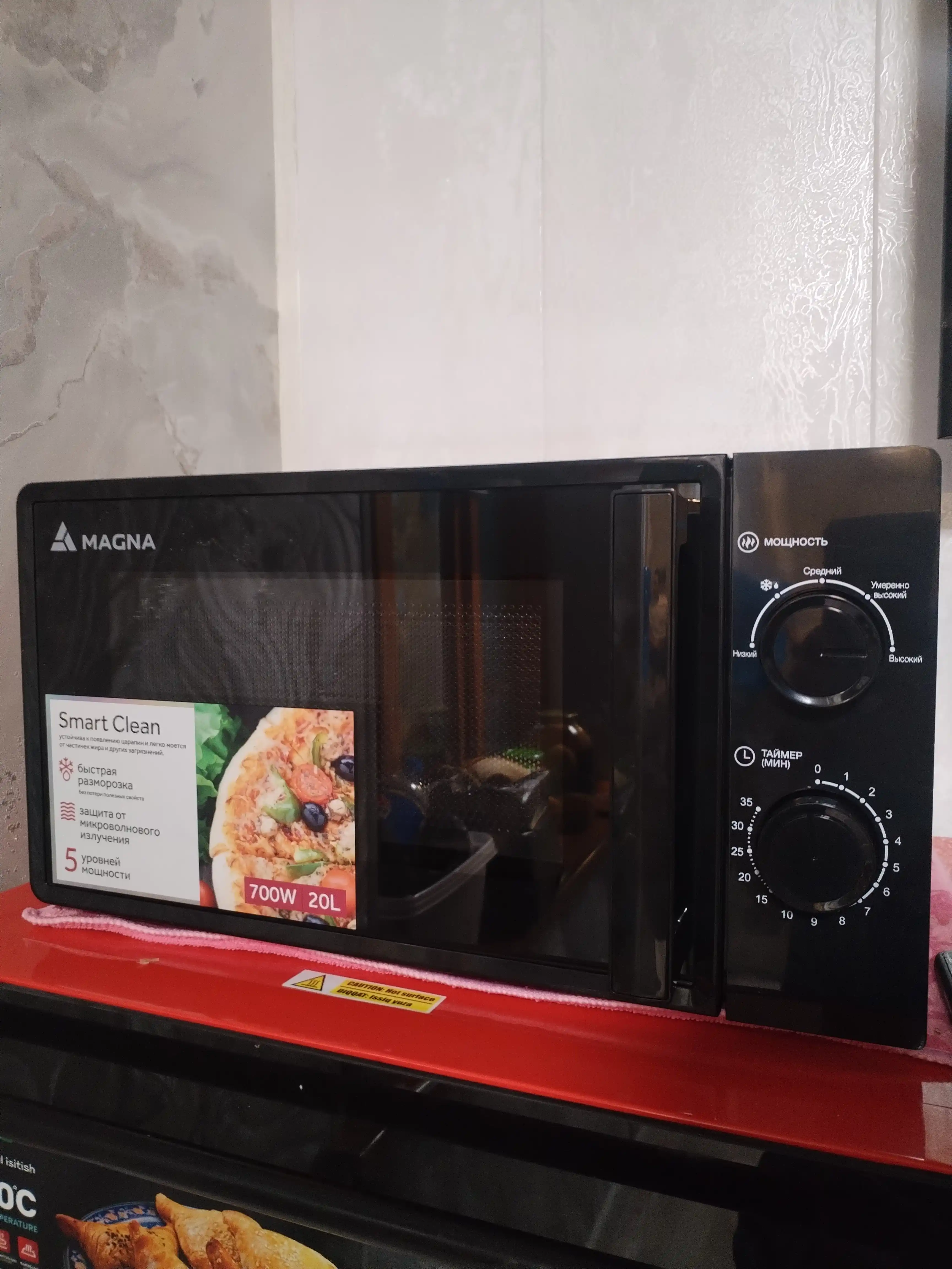 Mikroto'lqinli pech Magna M20W7016, quvvati 700 Vt, 20 litr
