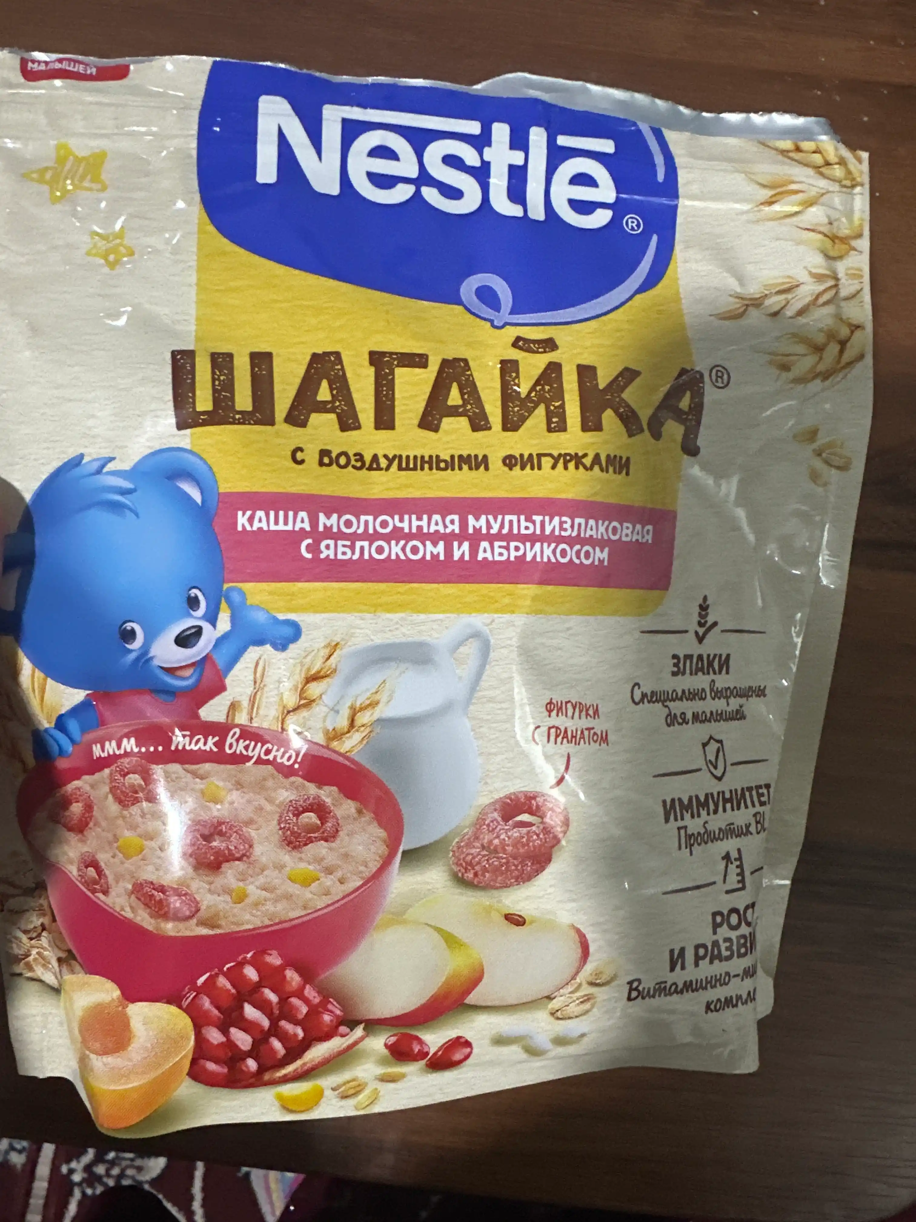Каша Nestle Шагайка "Мультизлаковая с гранатом, с яблоком и кусочками абрикоса", 190г