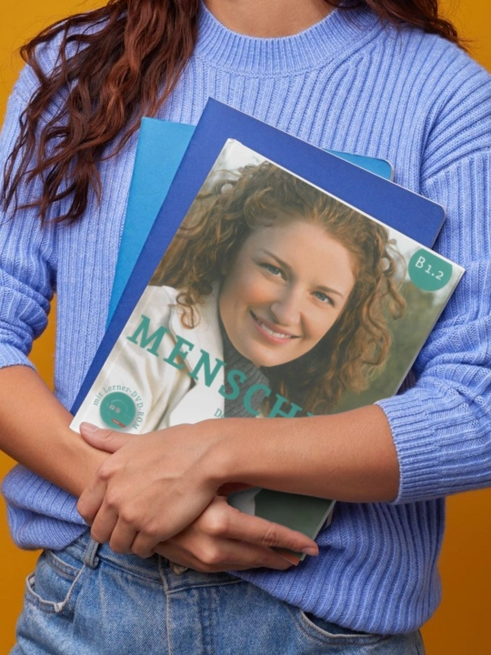 Menschen B1.2 nemis tili kurs kitobi — Deutsch als Fremdsprache