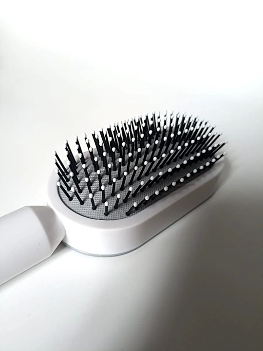 Soch uchun massajli taroq (Central Hollow Cushion Comb)