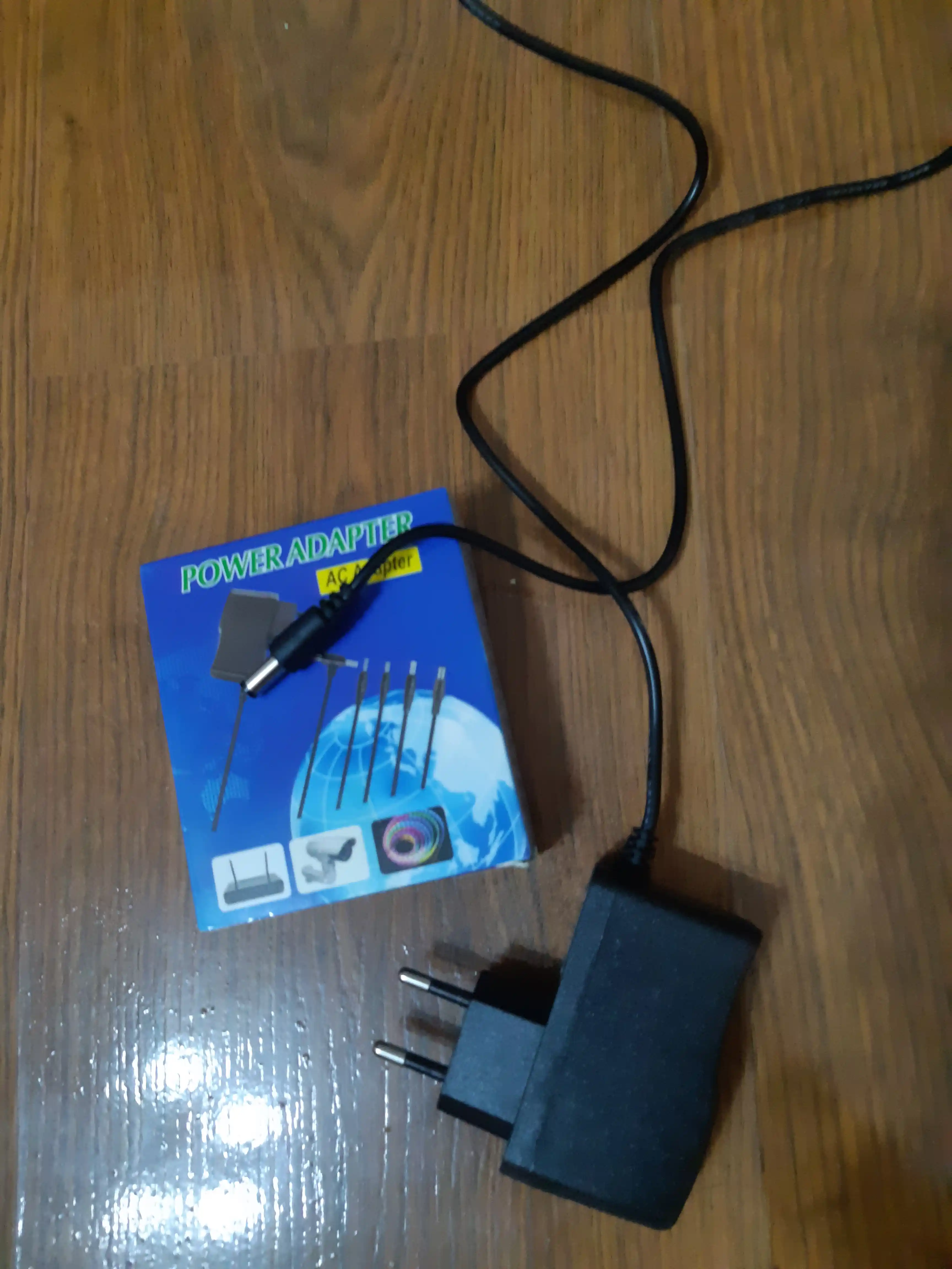 12V/1a AC/DC quvvat adapteri
