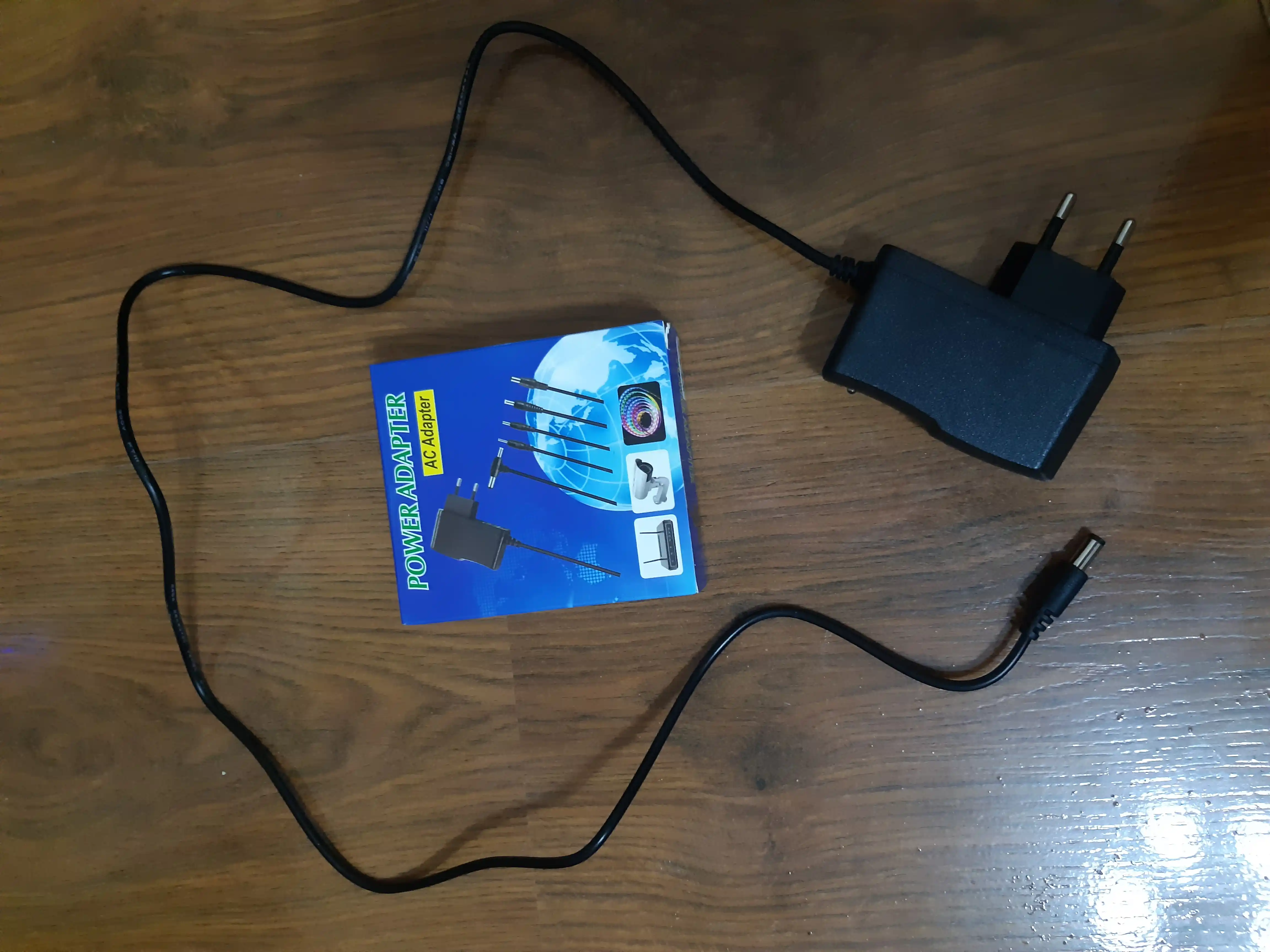 12V/1a AC/DC quvvat adapteri