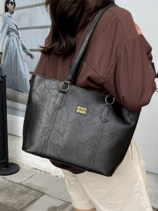 Ayollar uchun ZARMINA Classic tote sumkasi, eko-charm, qora, keng