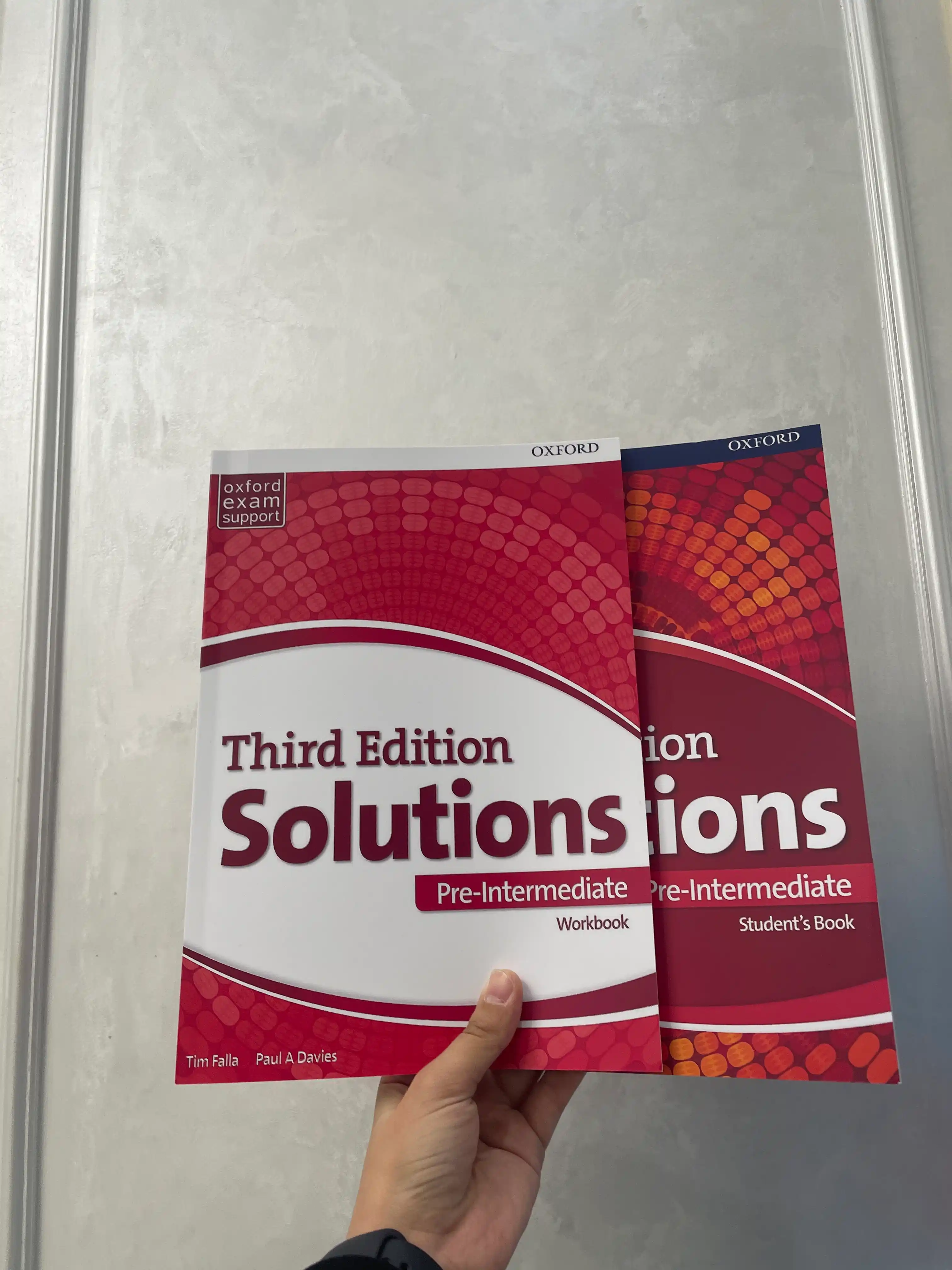 Solutions third Edition. Elementary, Pre-intermediate, Intermediate. Studentbook+Workbook
