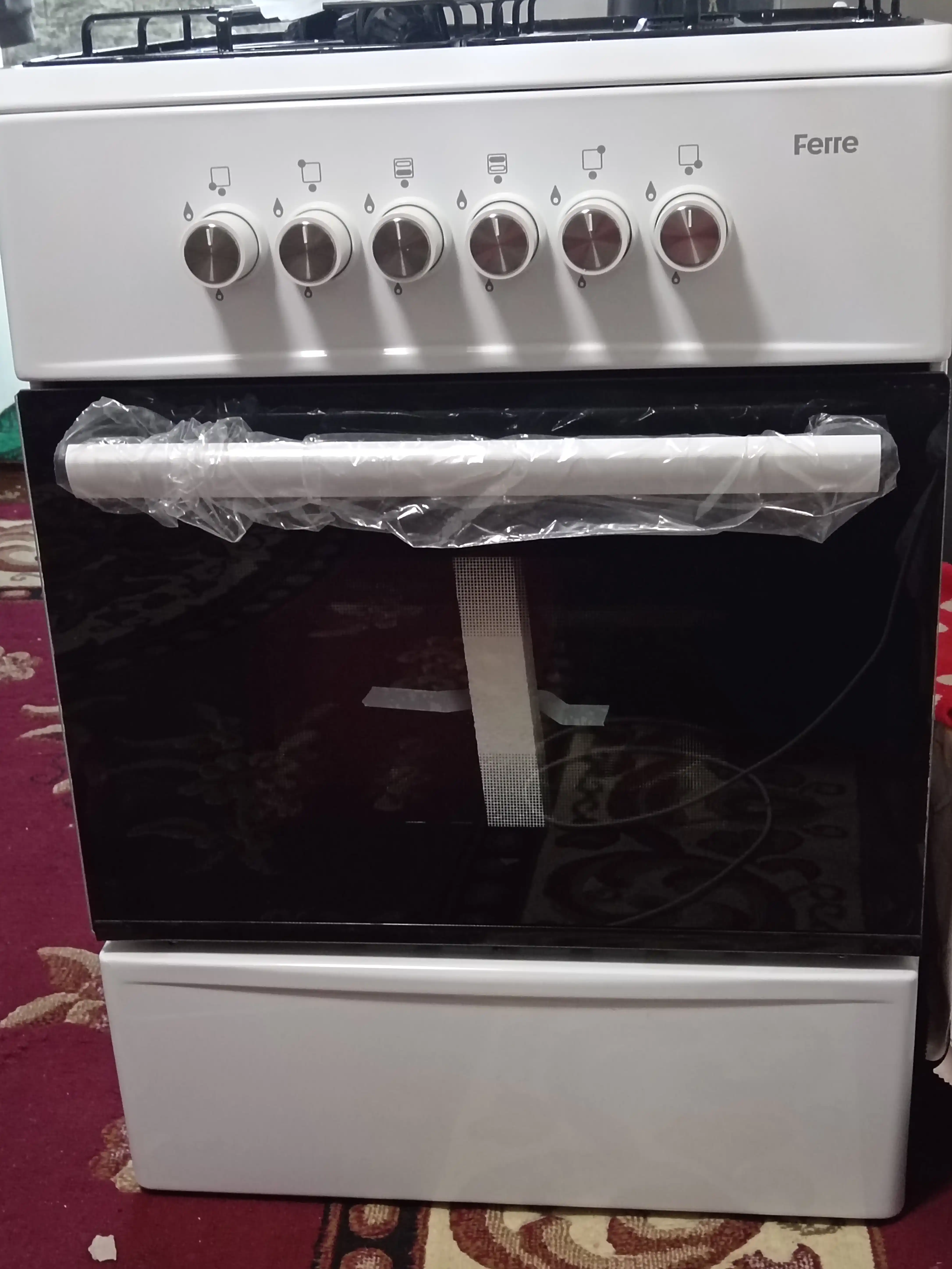 Gaz plitasi Ferre 57l, 4 gaz gorelka, temir panjara, katta hajmli duxovka