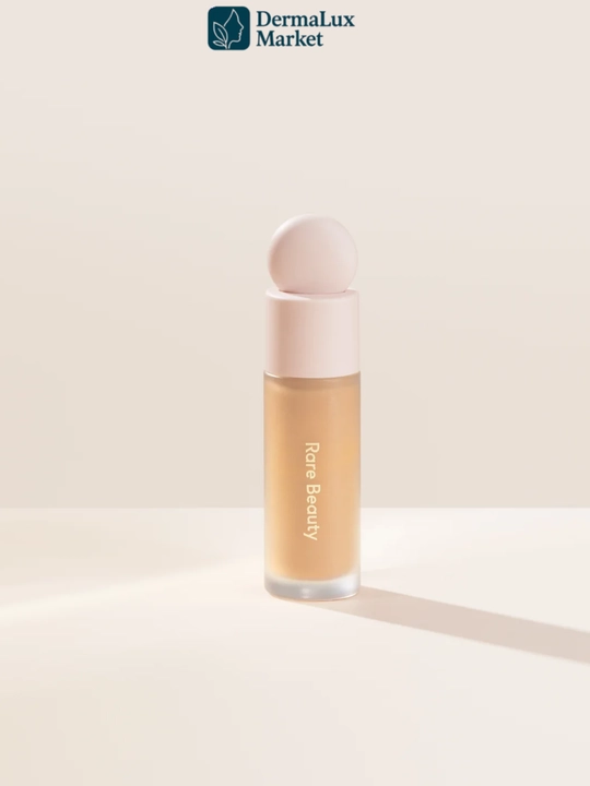 Konsiler Rare Beauty Liquid-terini yoritadi, nuqsonlarni yopadi, yengil va tabiiy qoplama