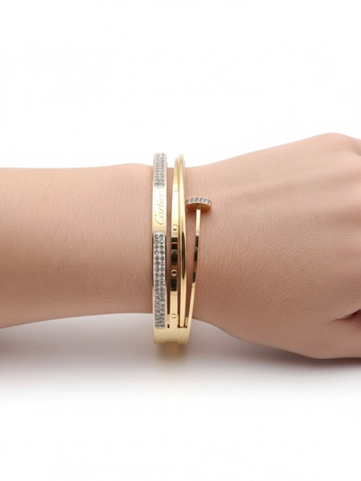 Женский браслет в стиле Cartier. Золотистое покрытие, инкрустация камнями. Браслет девушек — GOLDENW-CARTIERBILAGUZUKTAQINCHOQUY-ЗОЛОТ