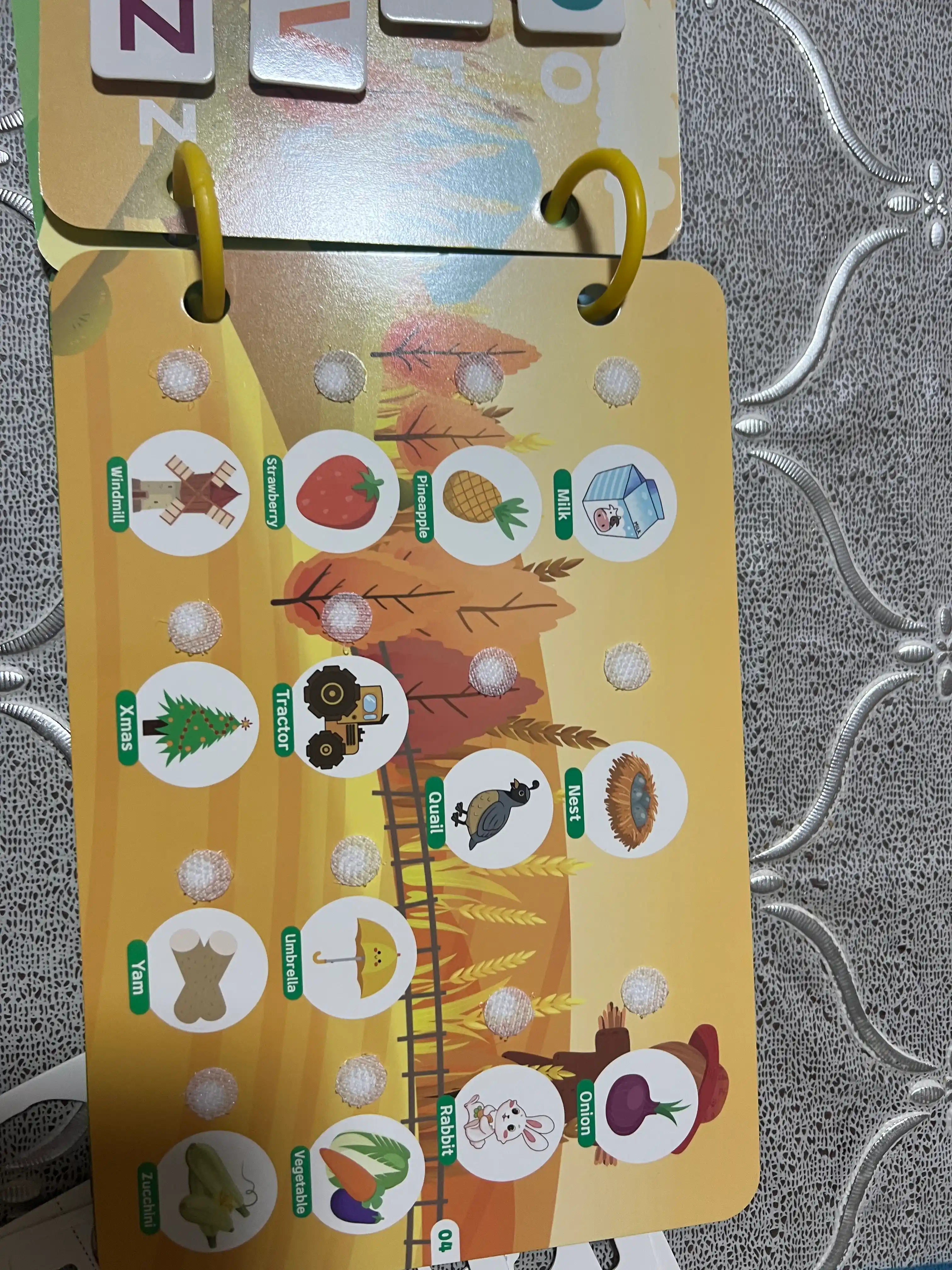 Bolalar uchun o'quv kitobi va alifbosi Busybook, lipuchkali Montessori kitobi