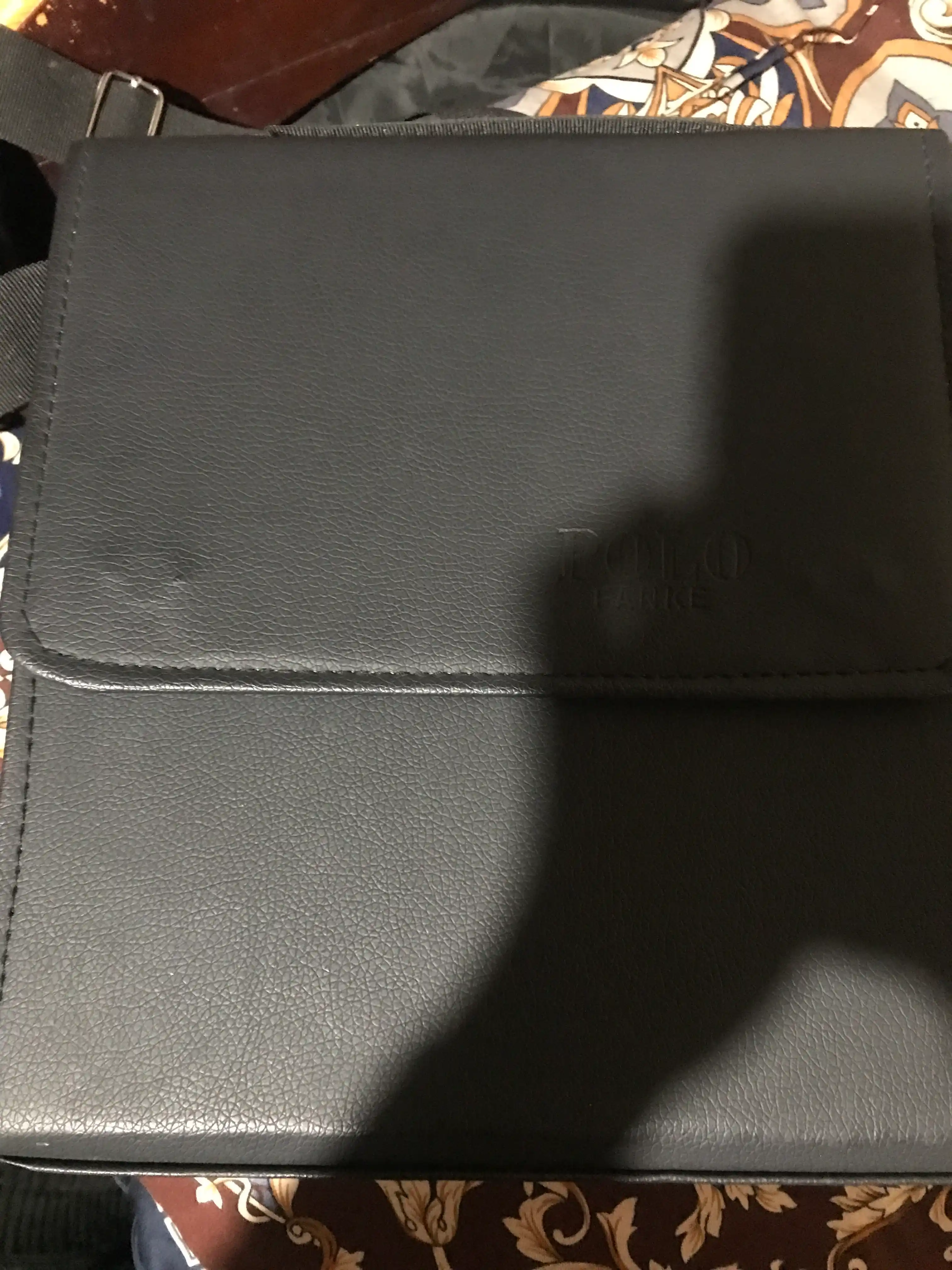 Erkaklar yelkama sumkasi