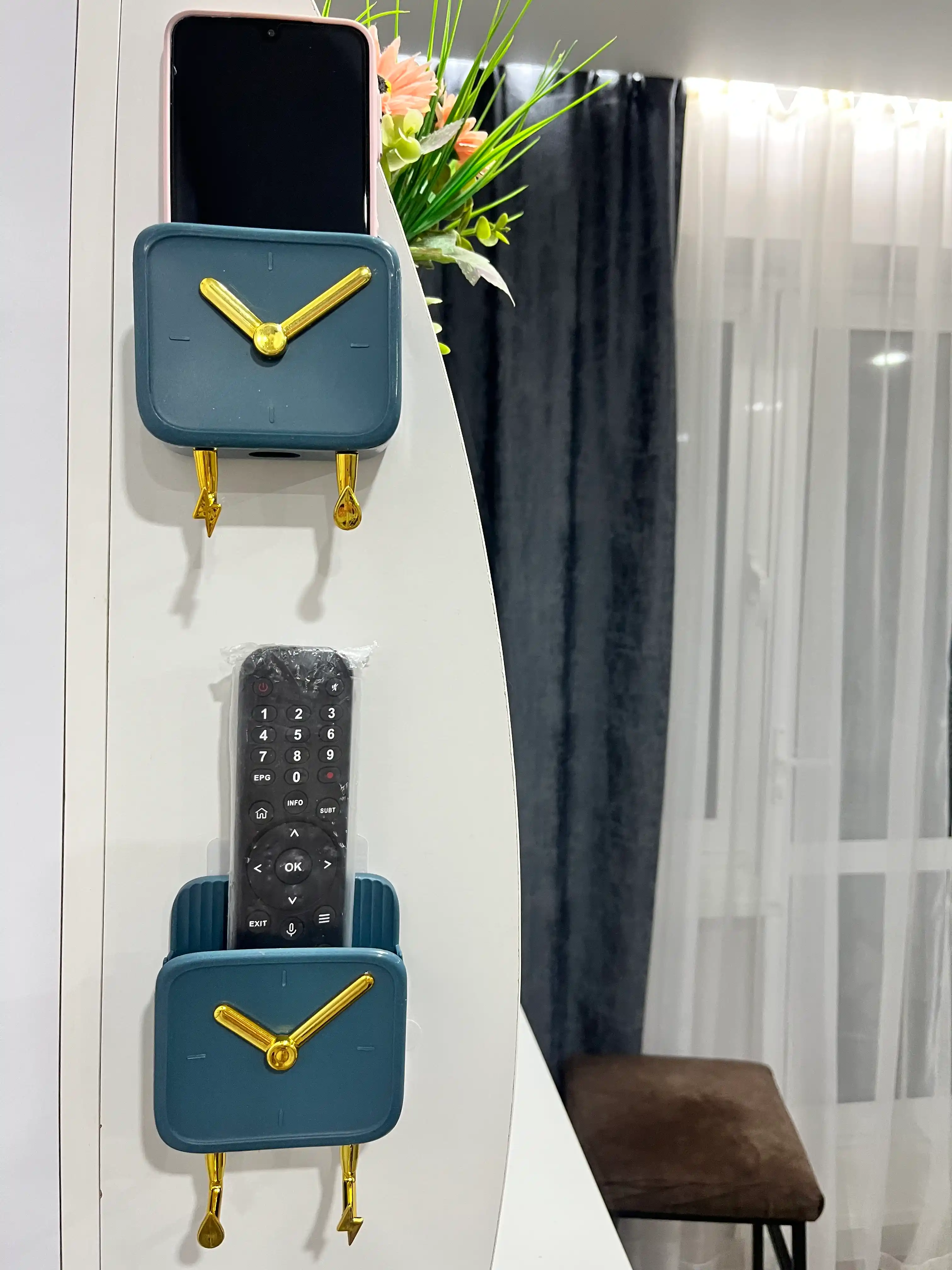 Telefon va pult uchun devor ushlagichi