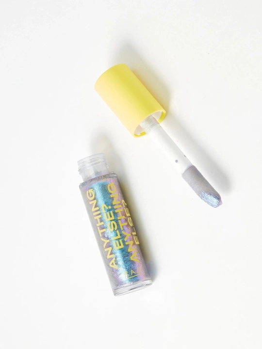Сверкающее покрытие для губ RAD Juicy Bits Top Coat