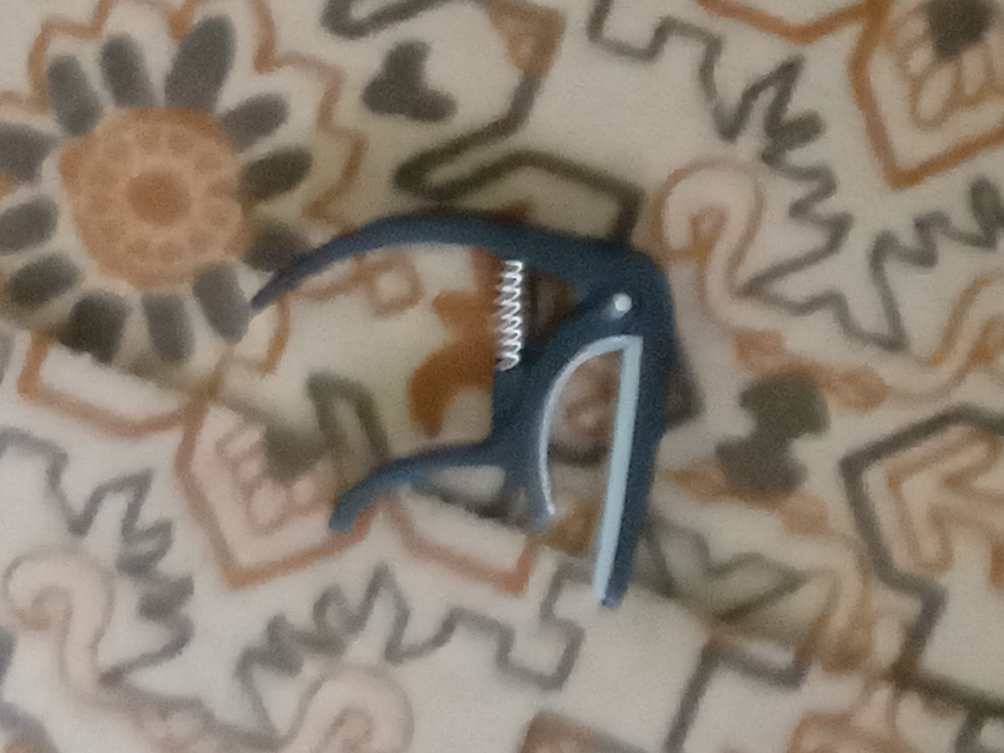 Gitara uchun kapodastr (Guitar Capo)