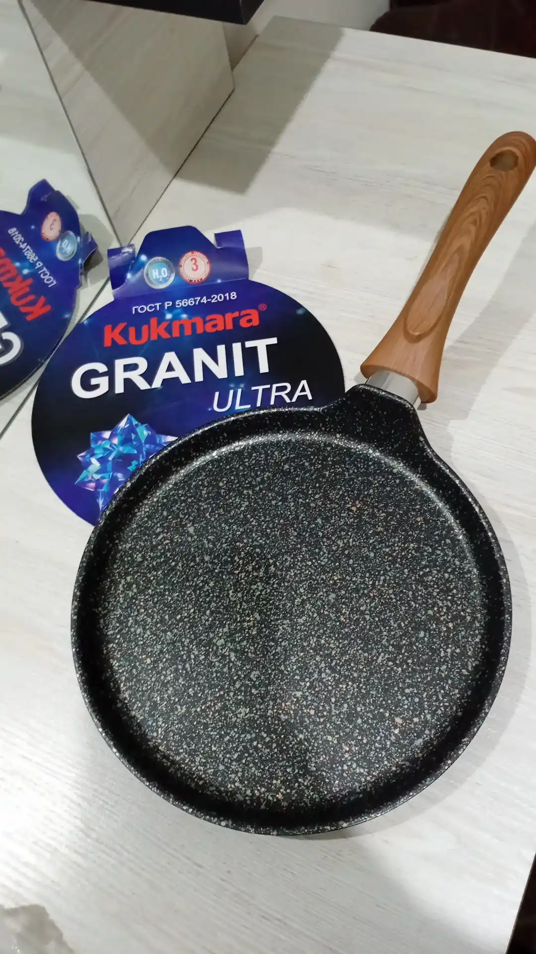 Kukmara Granit Ultra blinchik skovorodkasi, antipiqar qoplama, 22/24 sm, tutqichli